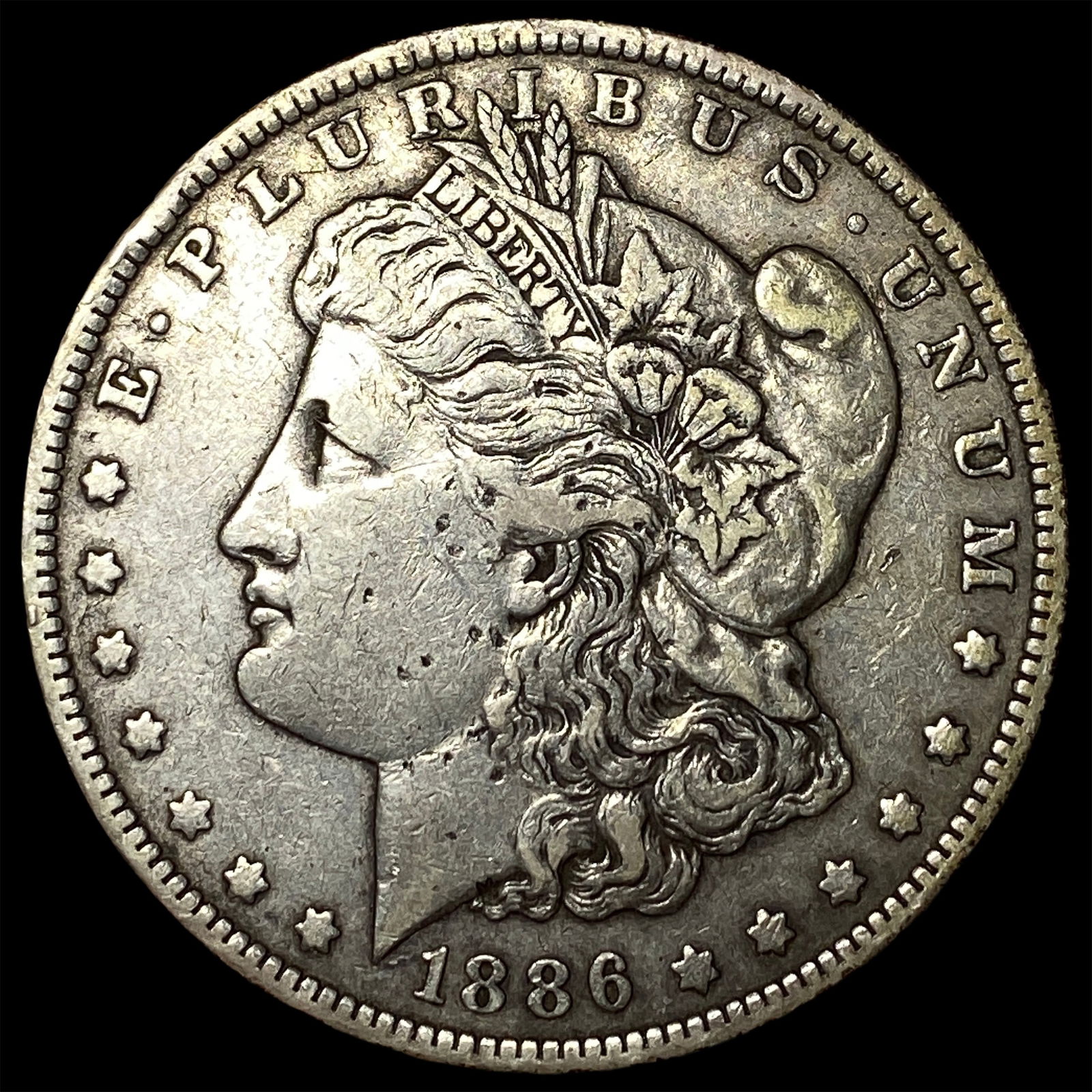 1886-O Silver Morgan Dollar NEARLY UNCIRCULATED: 1886-O Silver Morgan Dollar NEARLY UNCIRCULATED