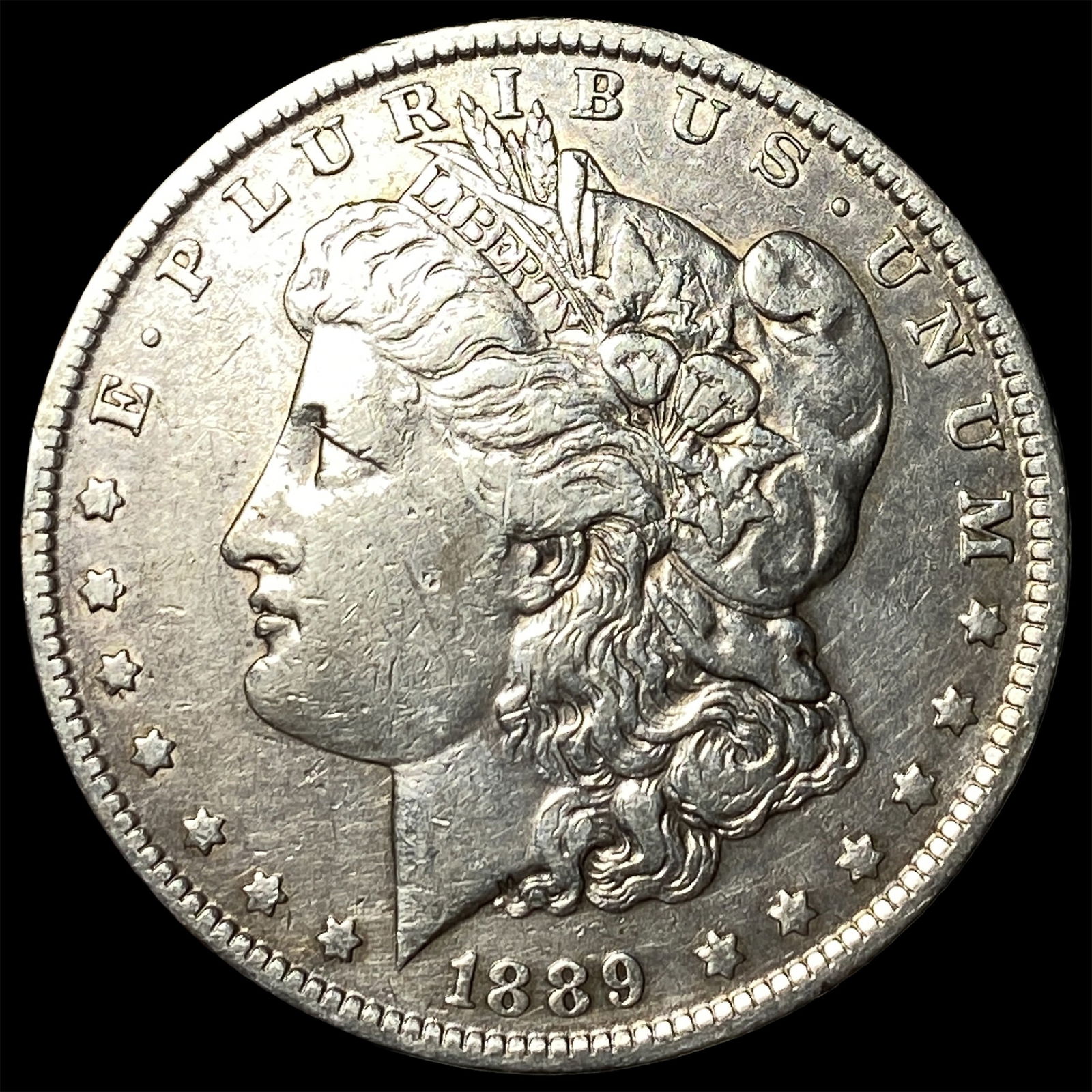 1889-O Silver Morgan Dollar NEARLY UNCIRCULATED (1 of 2)