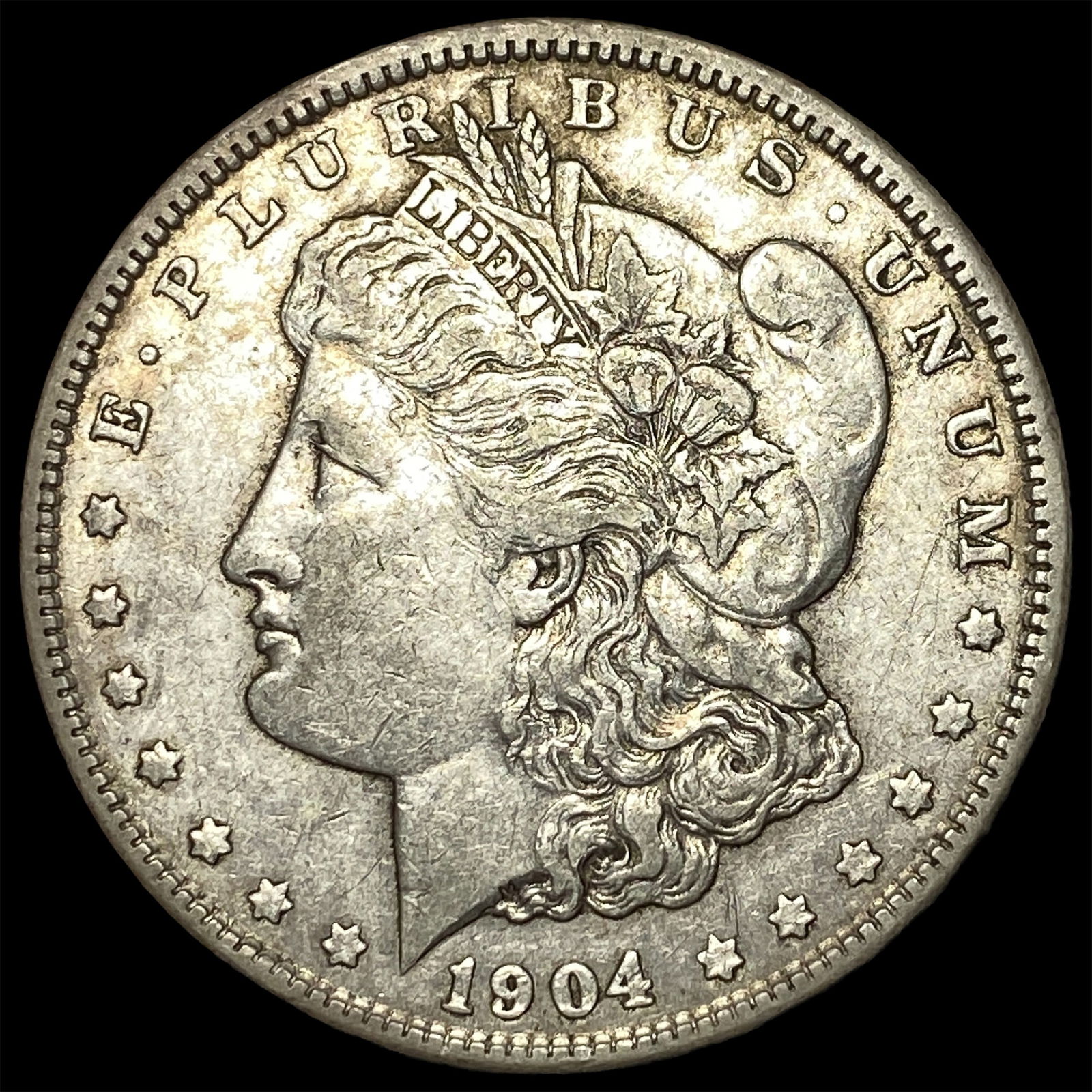1904 Silver Morgan Dollar NEARLY UNCIRCULATED (1 of 2)