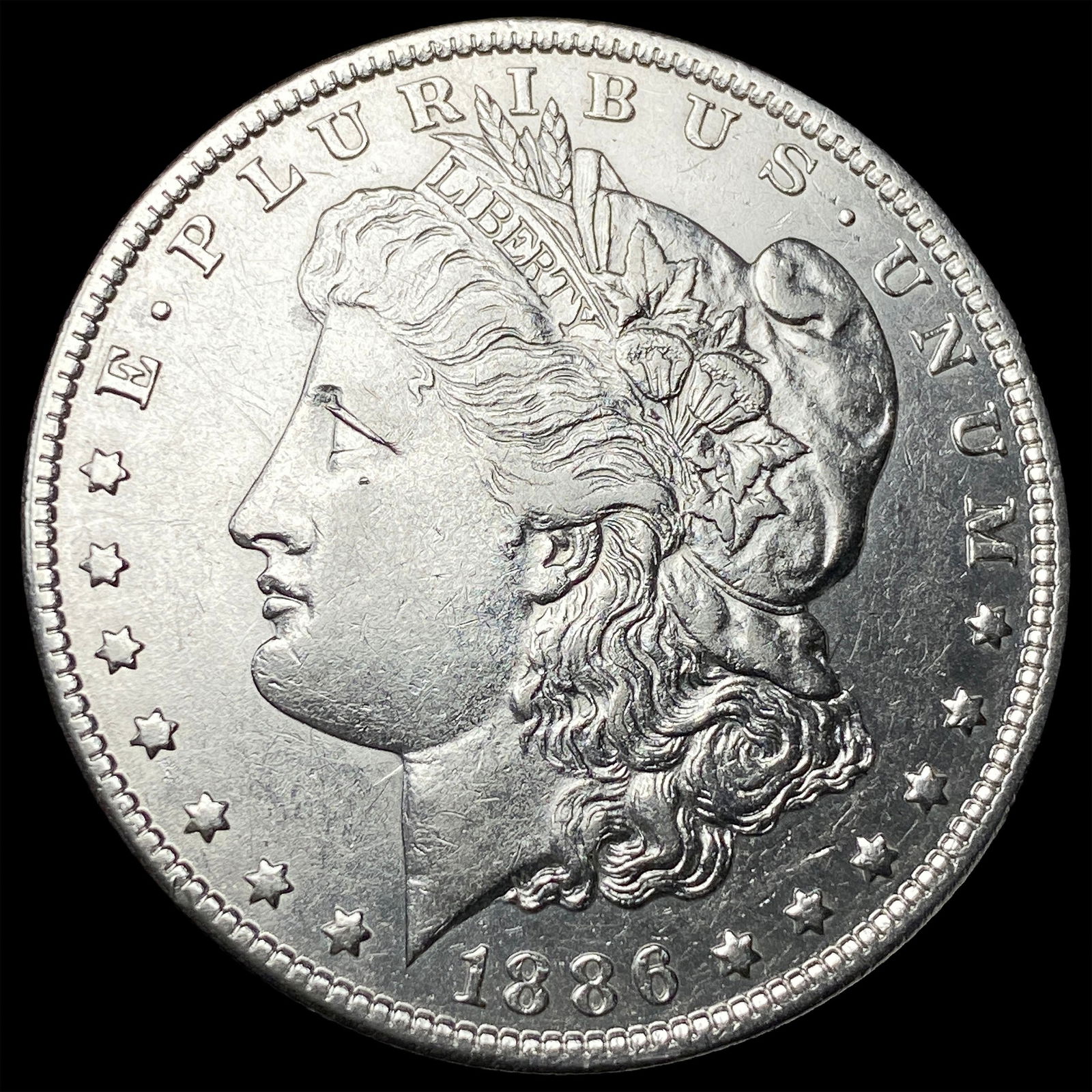 1886-O Silver Morgan Dollar CLOSELY UNCIRCULATED: 1886-O Silver Morgan Dollar CLOSELY UNCIRCULATED