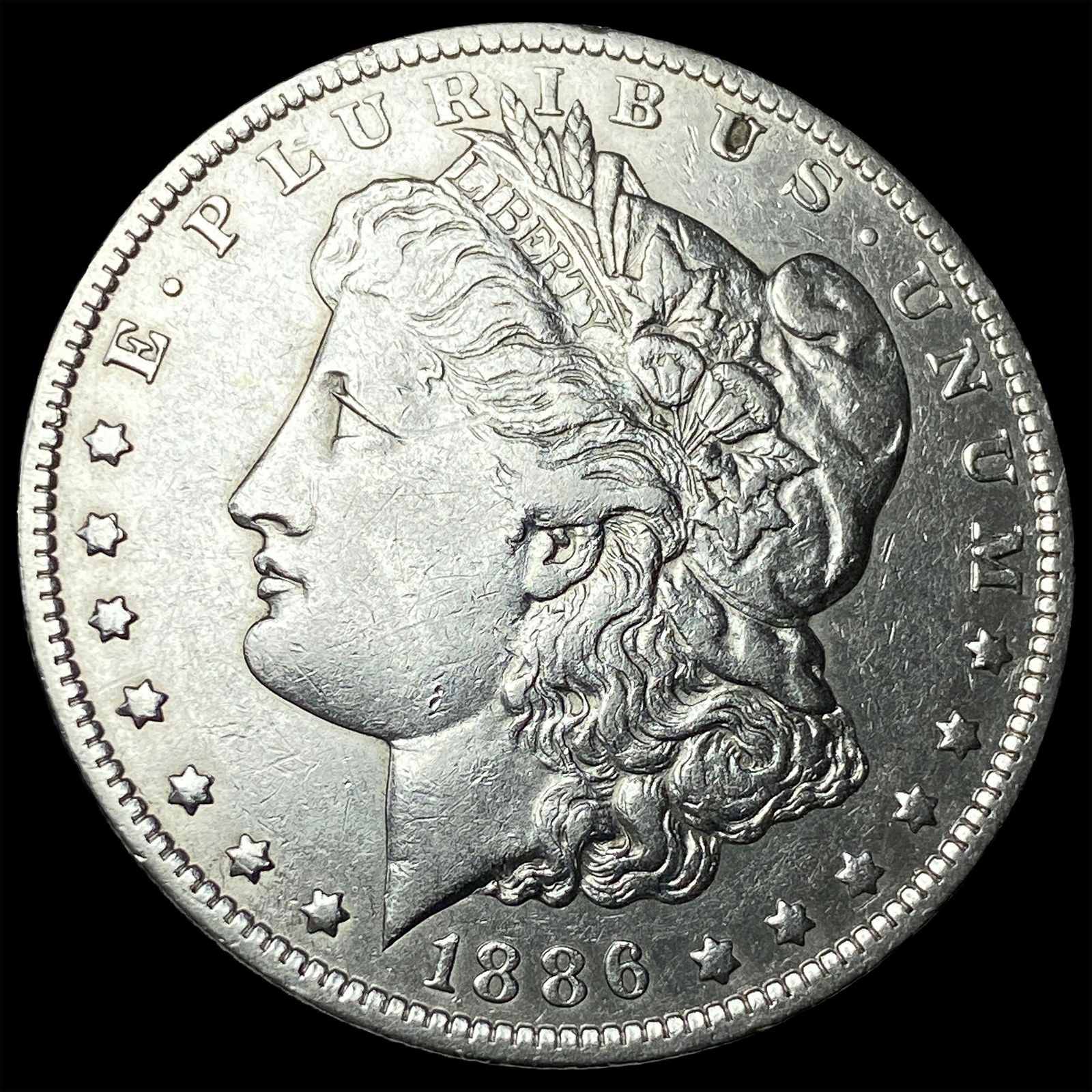 1886-O Silver Morgan Dollar CLOSELY UNCIRCULATED: 1886-O Silver Morgan Dollar CLOSELY UNCIRCULATED