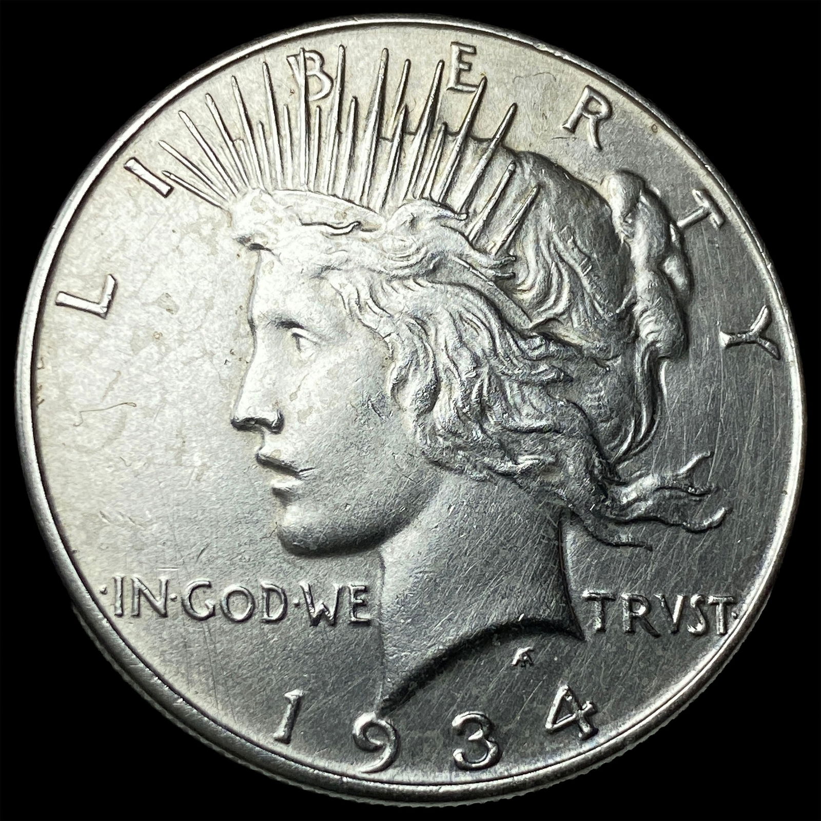1934 Peace Silver Dollar CLOSELY UNCIRCULATED (1 of 2)