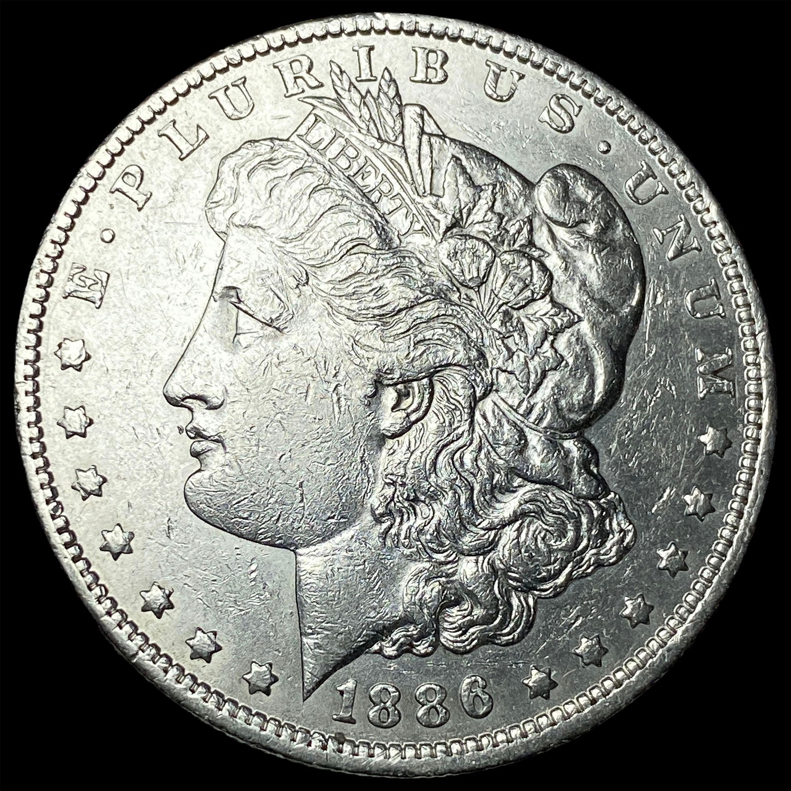 1886-O Silver Morgan Dollar CLOSELY UNCIRCULATED: 1886-O Silver Morgan Dollar CLOSELY UNCIRCULATED