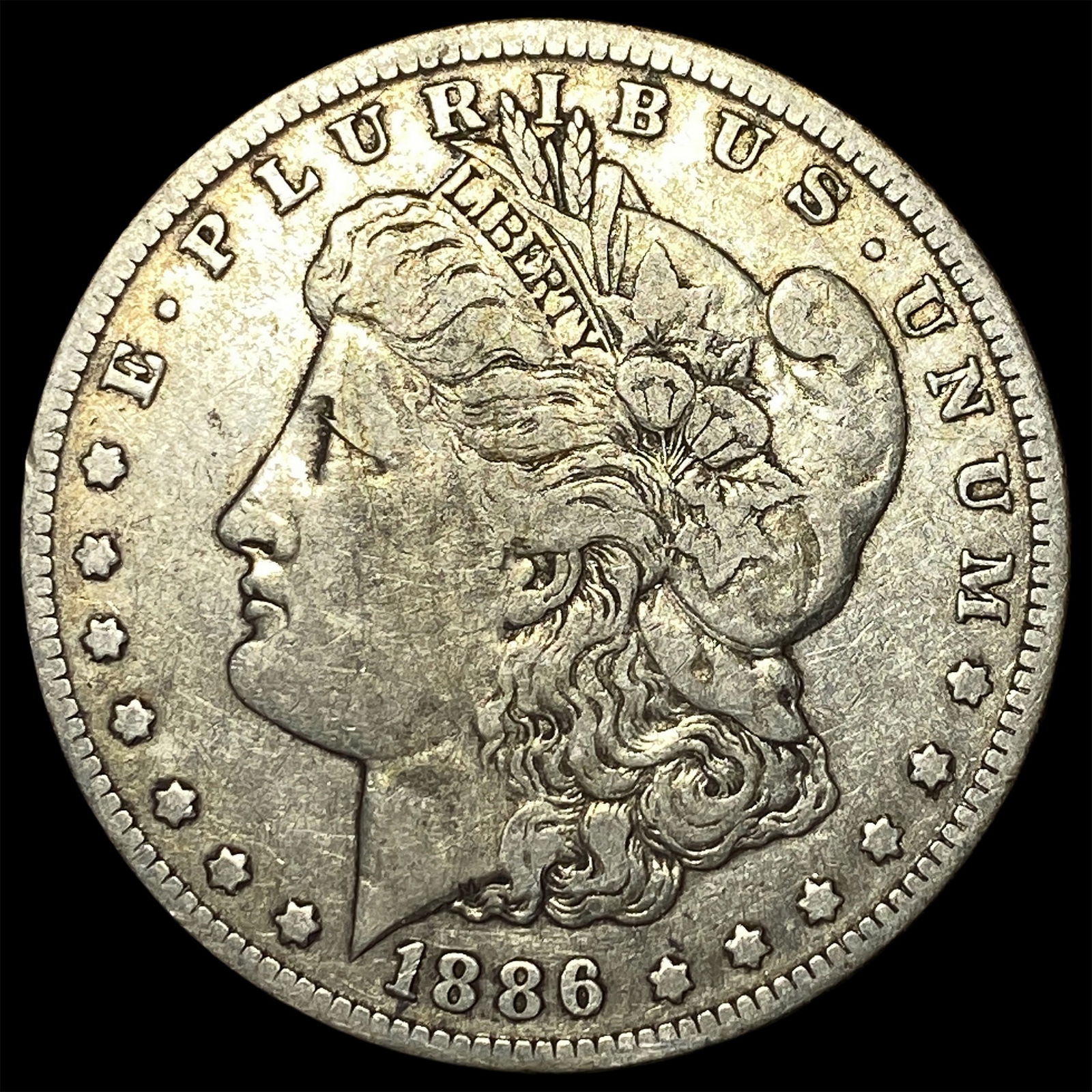 1886-O Silver Morgan Dollar ABOUT UNCIRCULATED: 1886-O Silver Morgan Dollar ABOUT UNCIRCULATED