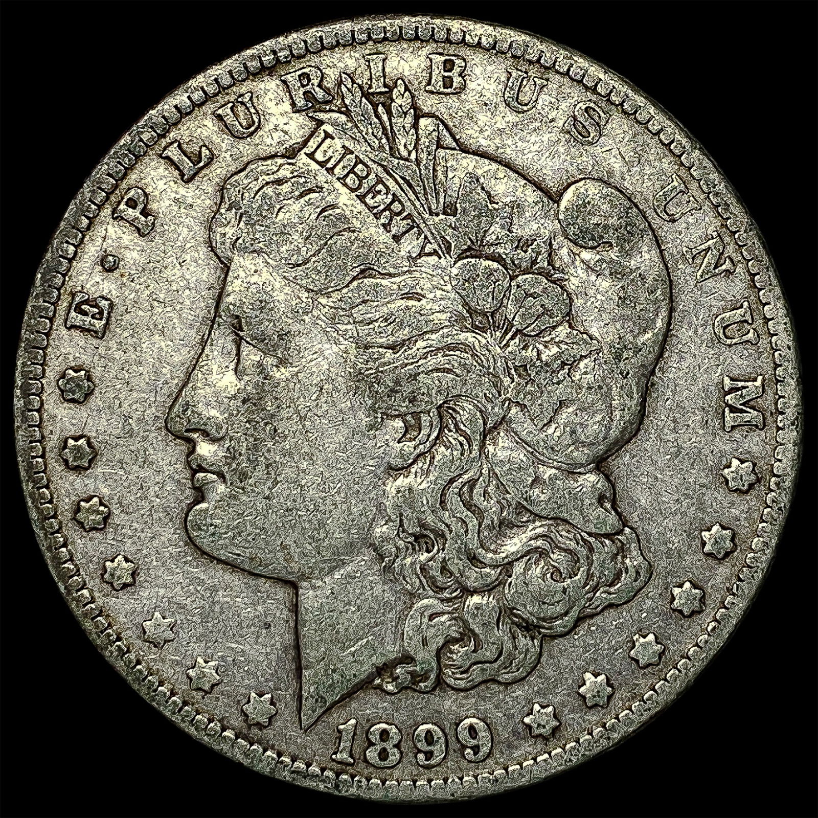 1899-O Silver Morgan Dollar ABOUT UNCIRCULATED: 1899-O Silver Morgan Dollar ABOUT UNCIRCULATED