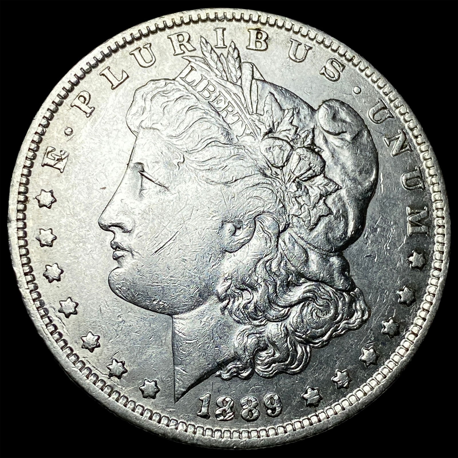 1889-O Morgan Silver Dollar CLOSELY UNCIRCULATED (1 of 2)