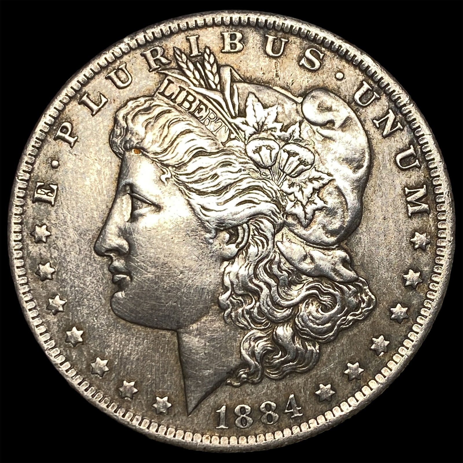 1884-O Silver Morgan Dollar CLOSELY UNCIRCULATED (1 of 2)