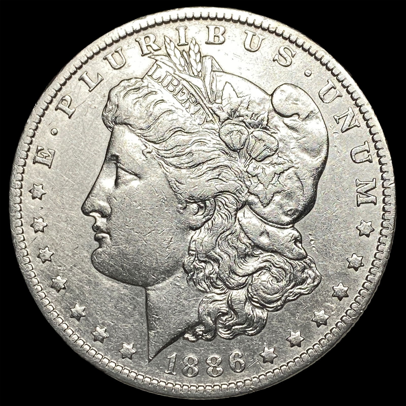 1886-O Silver Morgan Dollar NEARLY UNCIRCULATED: 1886-O Silver Morgan Dollar NEARLY UNCIRCULATED