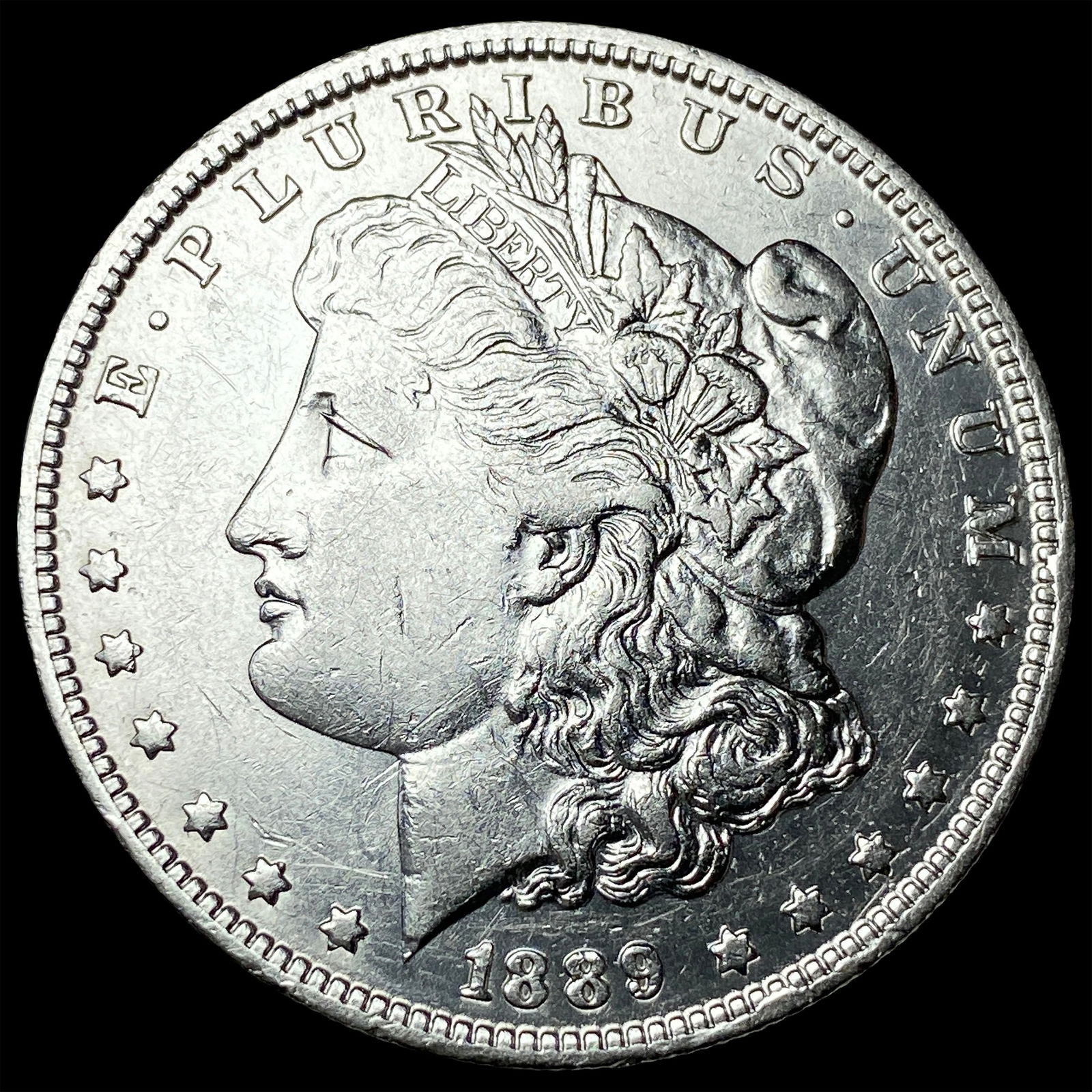 1889-O Silver Morgan Dollar CLOSELY UNCIRCULATED (1 of 2)