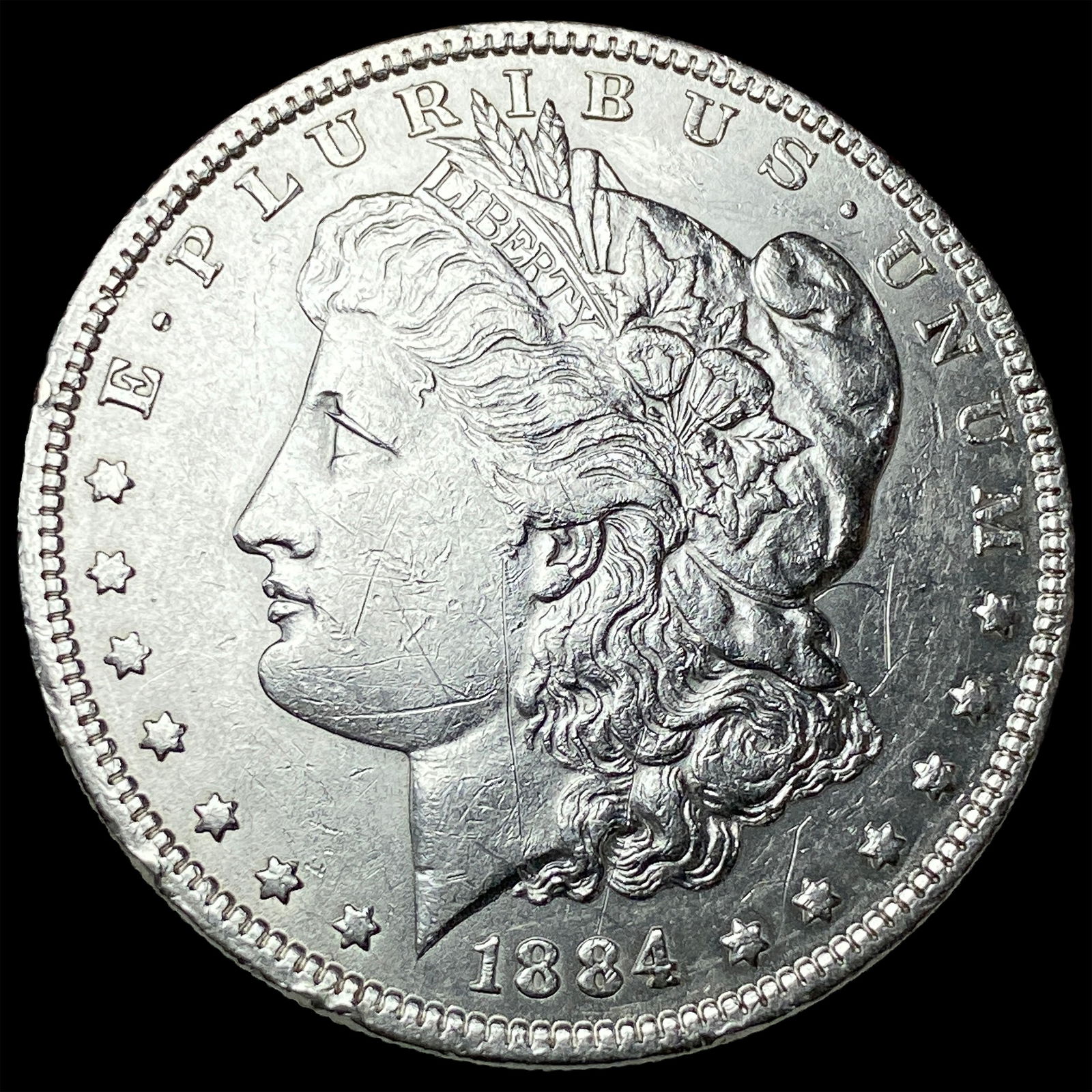 1884 Morgan Silver Dollar CLOSELY UNCIRCULATED (1 of 2)