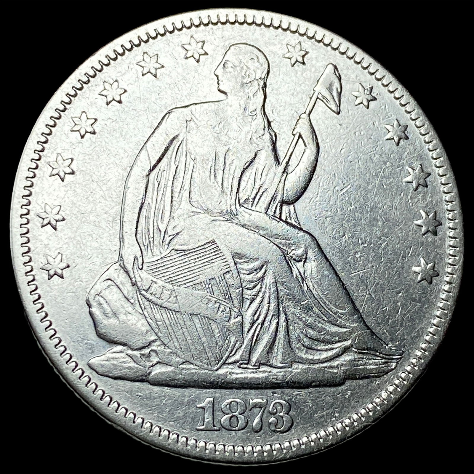 1873 Seated Liberty Half Dollar ABOUT UNCIRCULATED (1 of 2)
