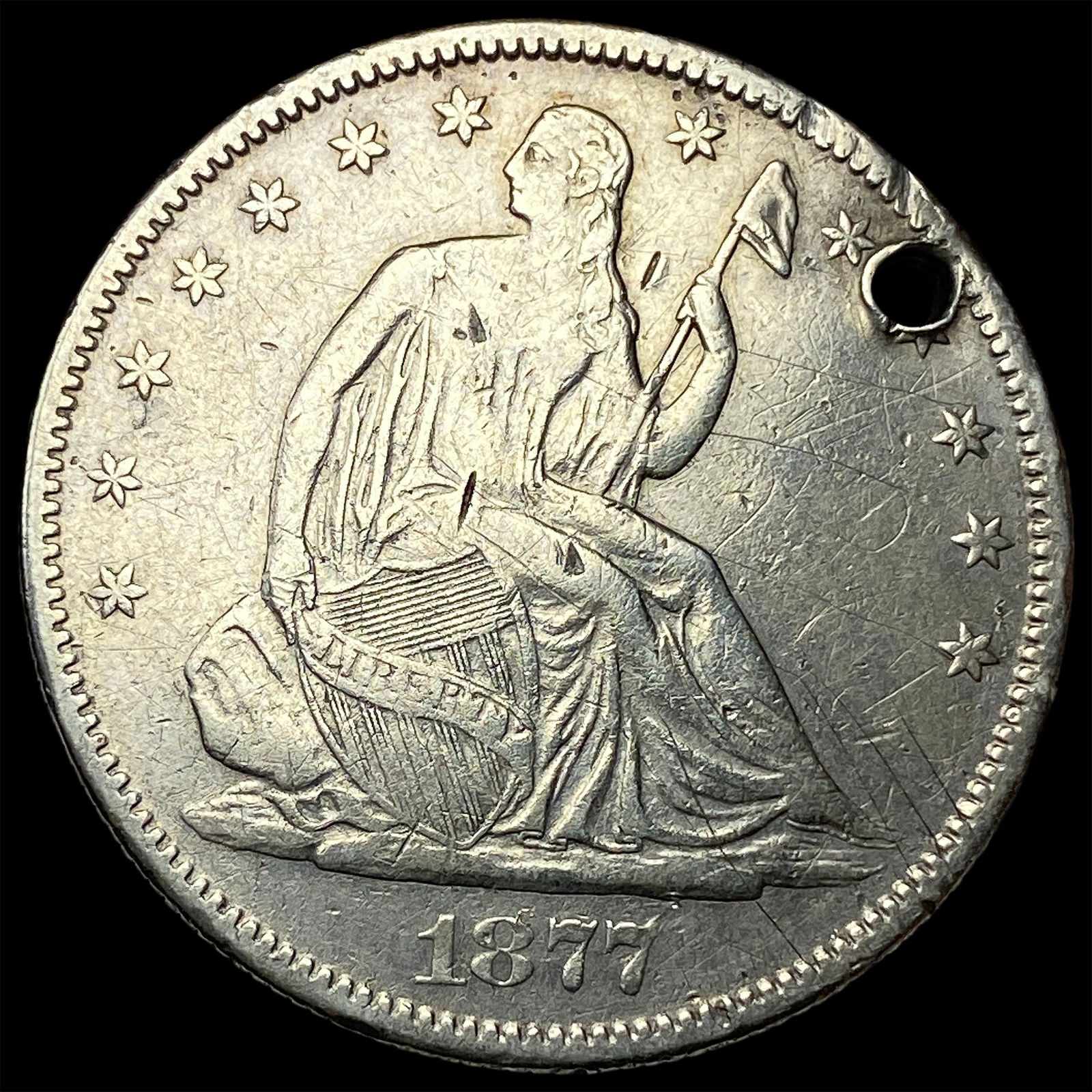 1877 Seated Liberty Half Dollar (holed) HIGH GRADE (1 of 2)