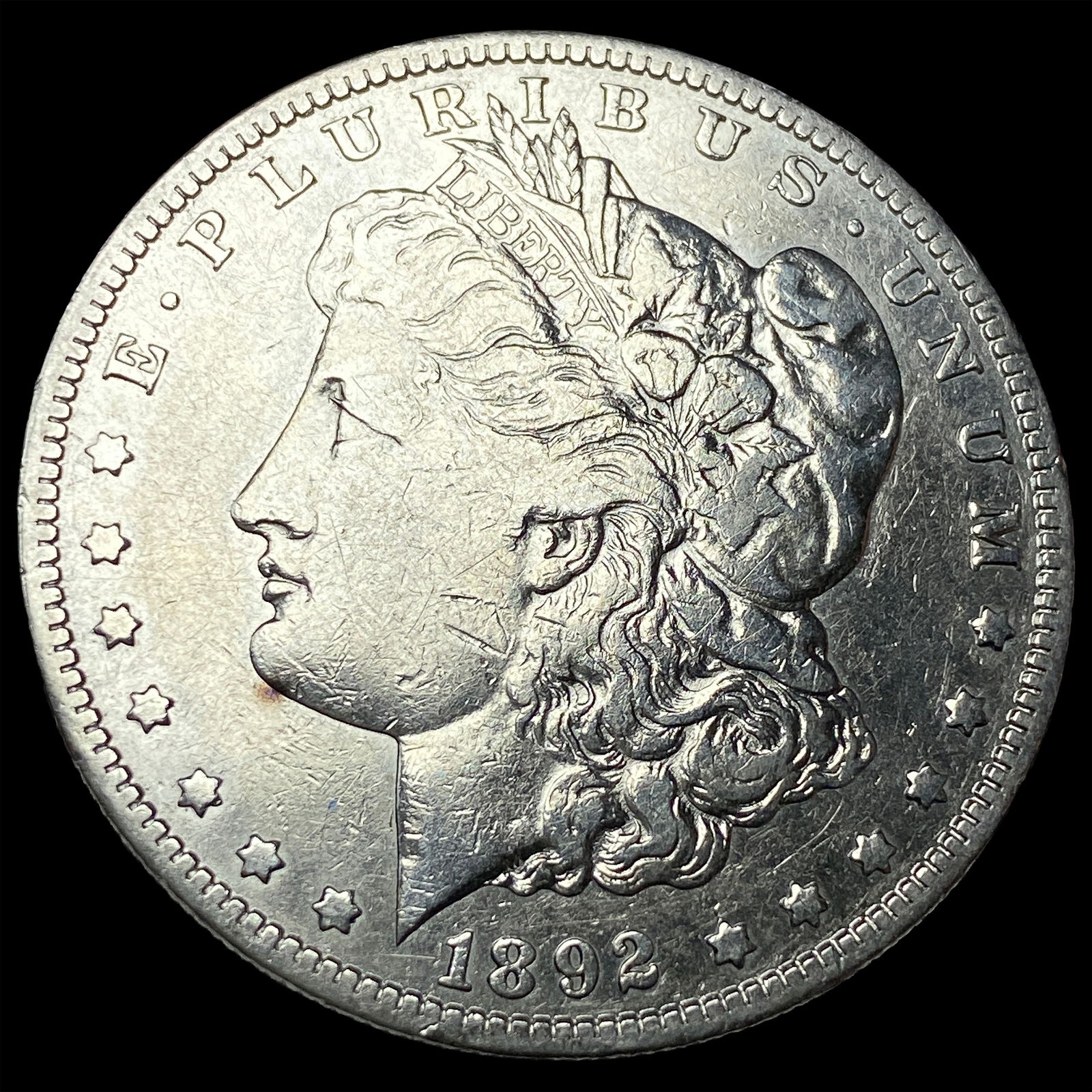 1892-S Silver Morgan Dollar ABOUT UNCIRCULATED: 1892-S Silver Morgan Dollar ABOUT UNCIRCULATED