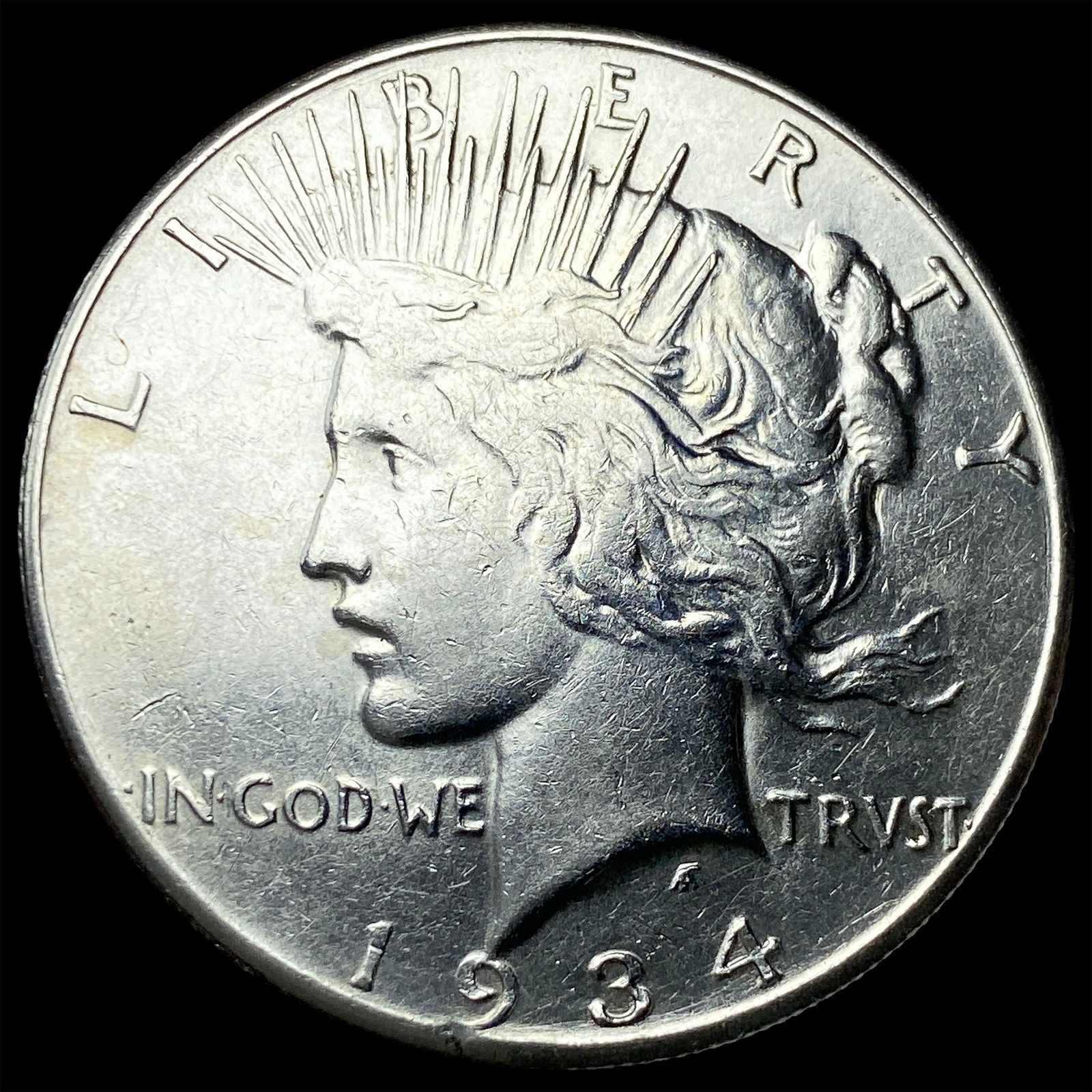 1934 Peace Silver Dollar CLOSELY UNCIRCULATED (1 of 2)
