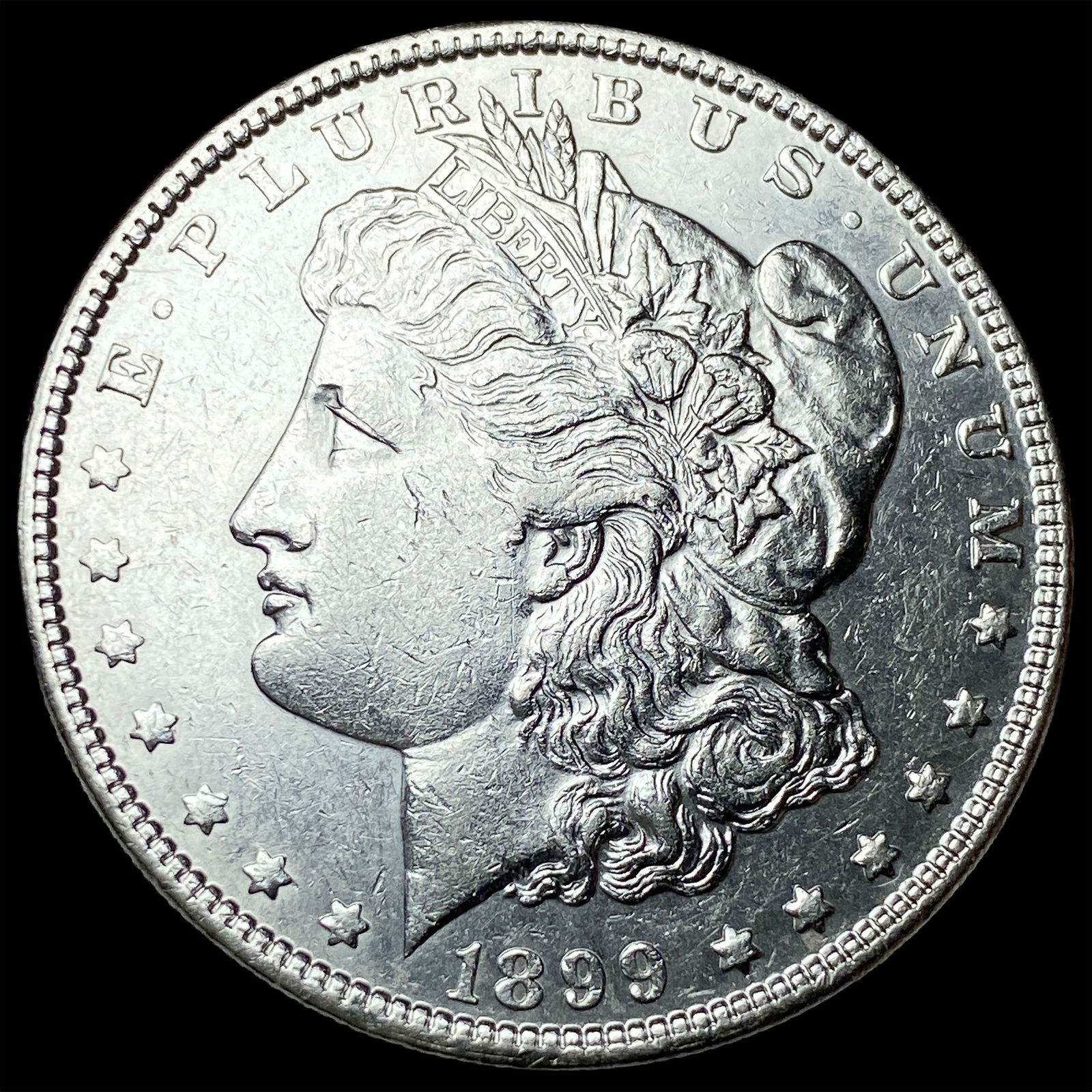 1899 Silver Morgan Dollar CLOSELY UNCIRCULATED: 1899 Silver Morgan Dollar CLOSELY UNCIRCULATED