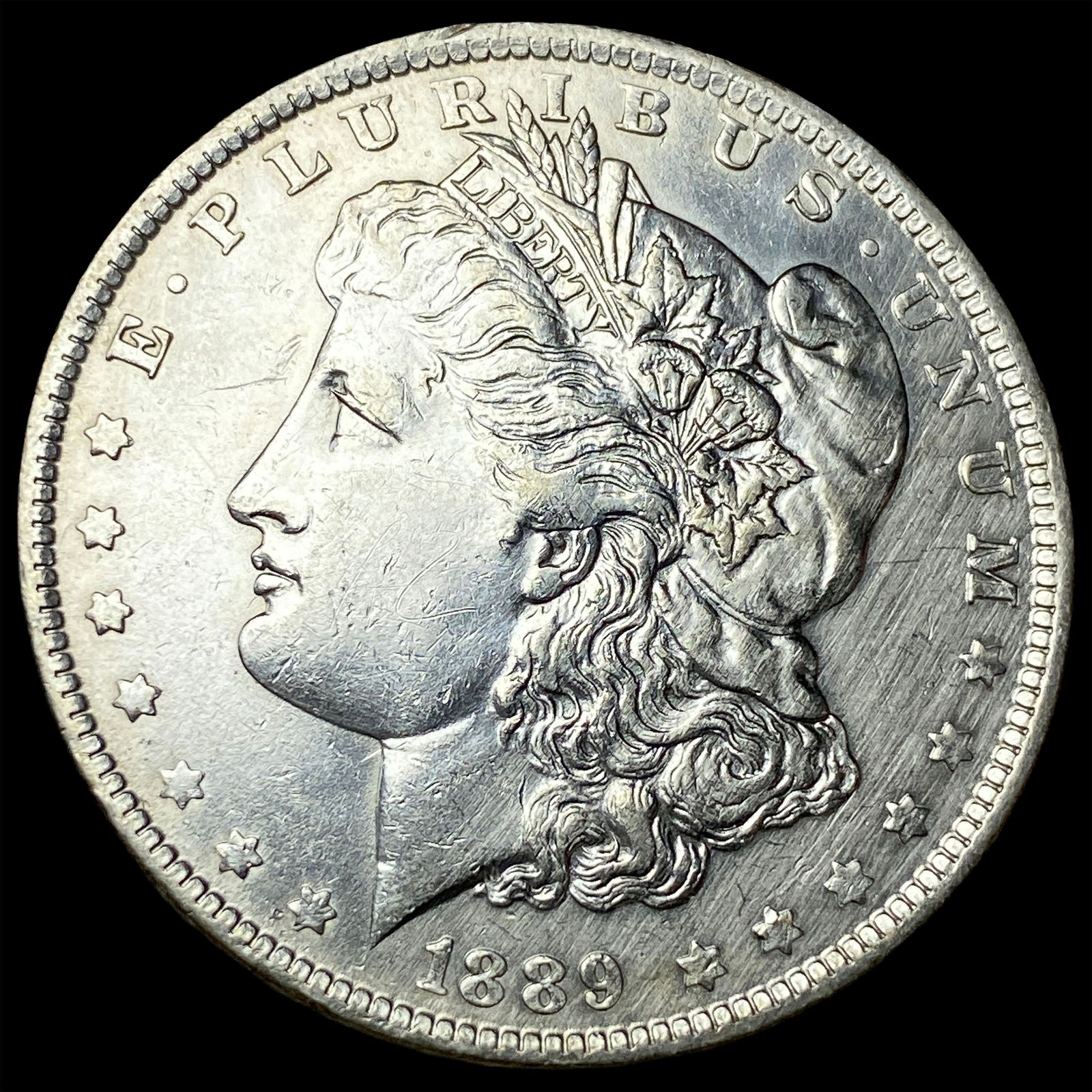 1889-O Silver Morgan Dollar CLOSELY UNCIRCULATED (1 of 2)