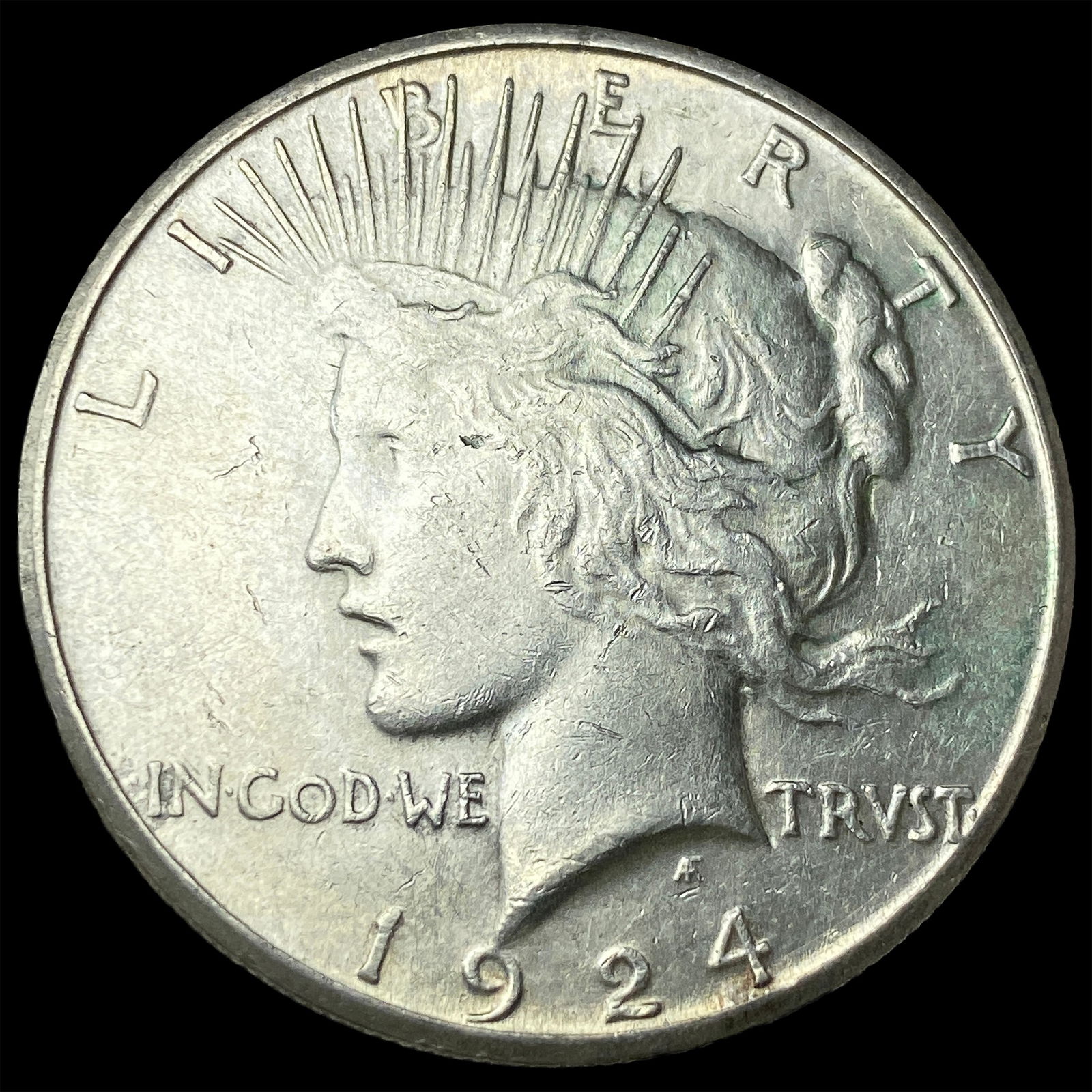 1924-S Silver Peace Dollar CLOSELY UNCIRCULATED (1 of 2)