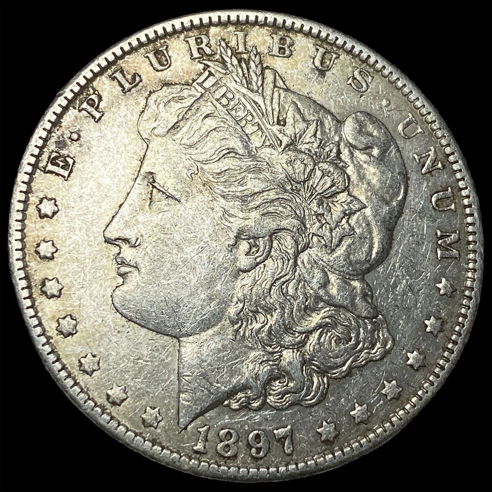 1897-O Silver Morgan Dollar NEARLY UNCIRCULATED (1 of 2)