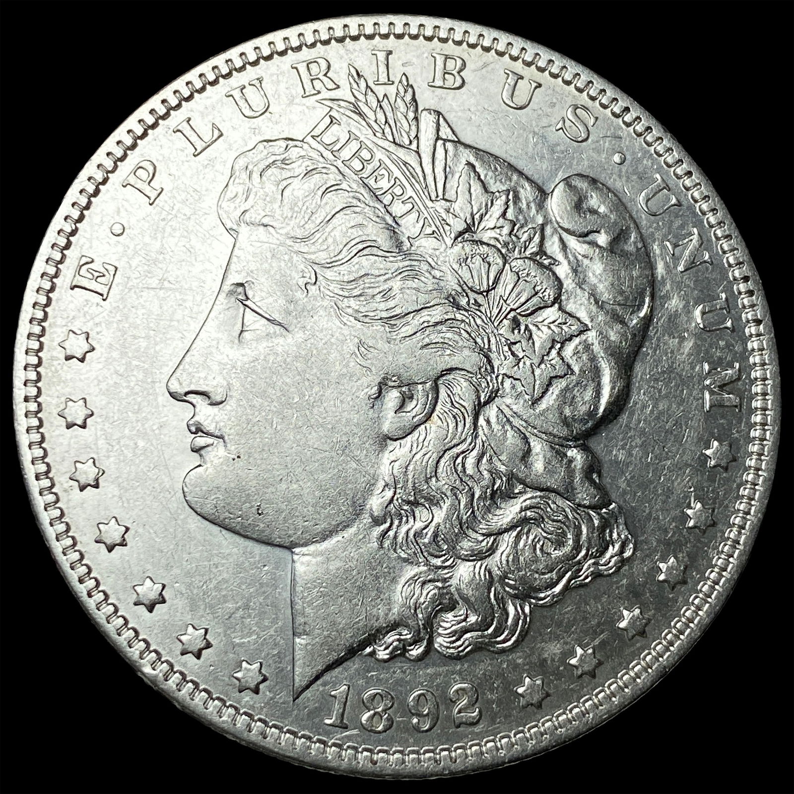 1892-O Silver Morgan Dollar NEARLY UNCIRCULATED (1 of 2)