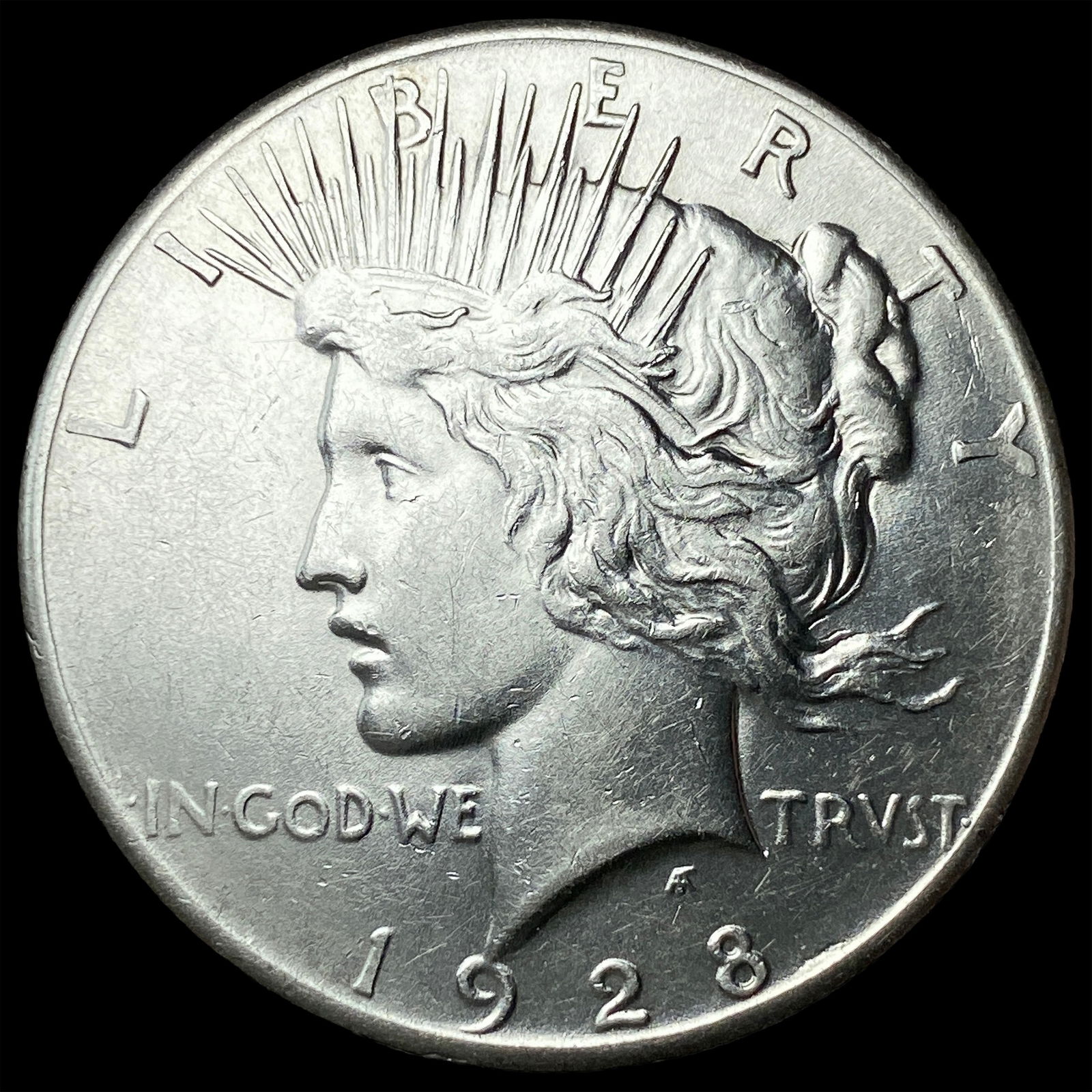 1928 Silver Peace Dollar CLOSELY UNCIRCULATED (1 of 2)