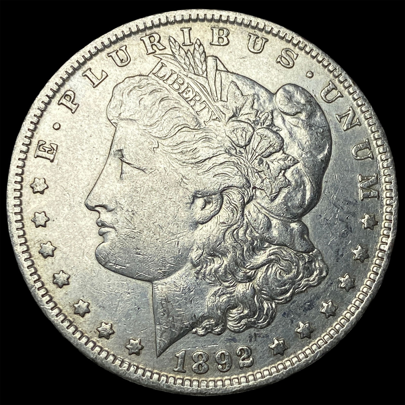 1892-O Silver Morgan Dollar CLOSELY UNCIRCULATED (1 of 2)