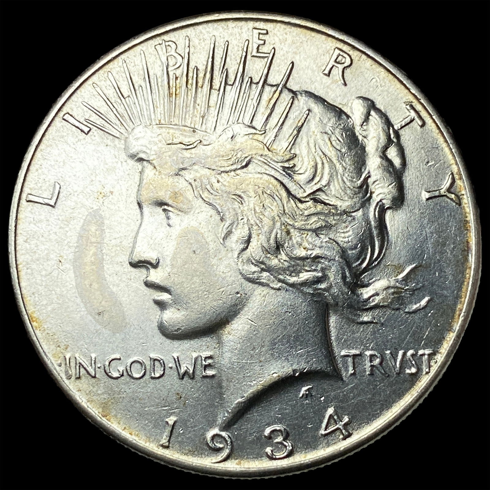 1934 Peace Silver Dollar CLOSELY UNCIRCULATED (1 of 2)