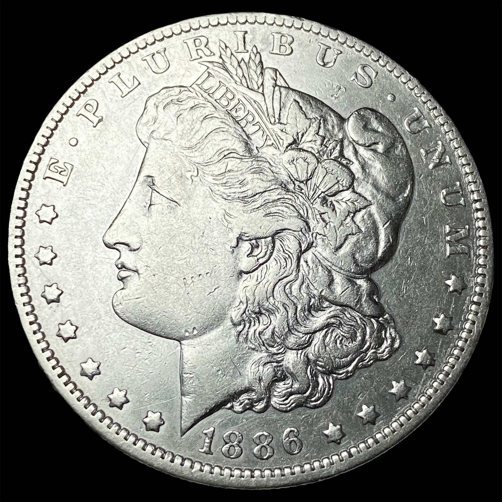 1886-O Silver Morgan Dollar NEARLY UNCIRCULATED: 1886-O Silver Morgan Dollar NEARLY UNCIRCULATED