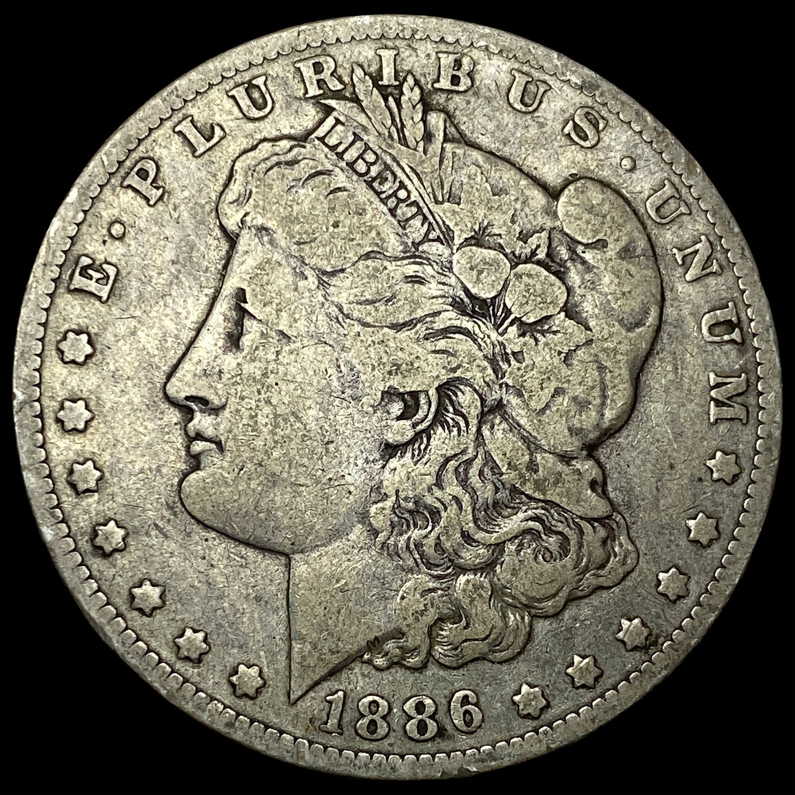 1886-O Silver Morgan Dollar ABOUT UNCIRCULATED: 1886-O Silver Morgan Dollar ABOUT UNCIRCULATED