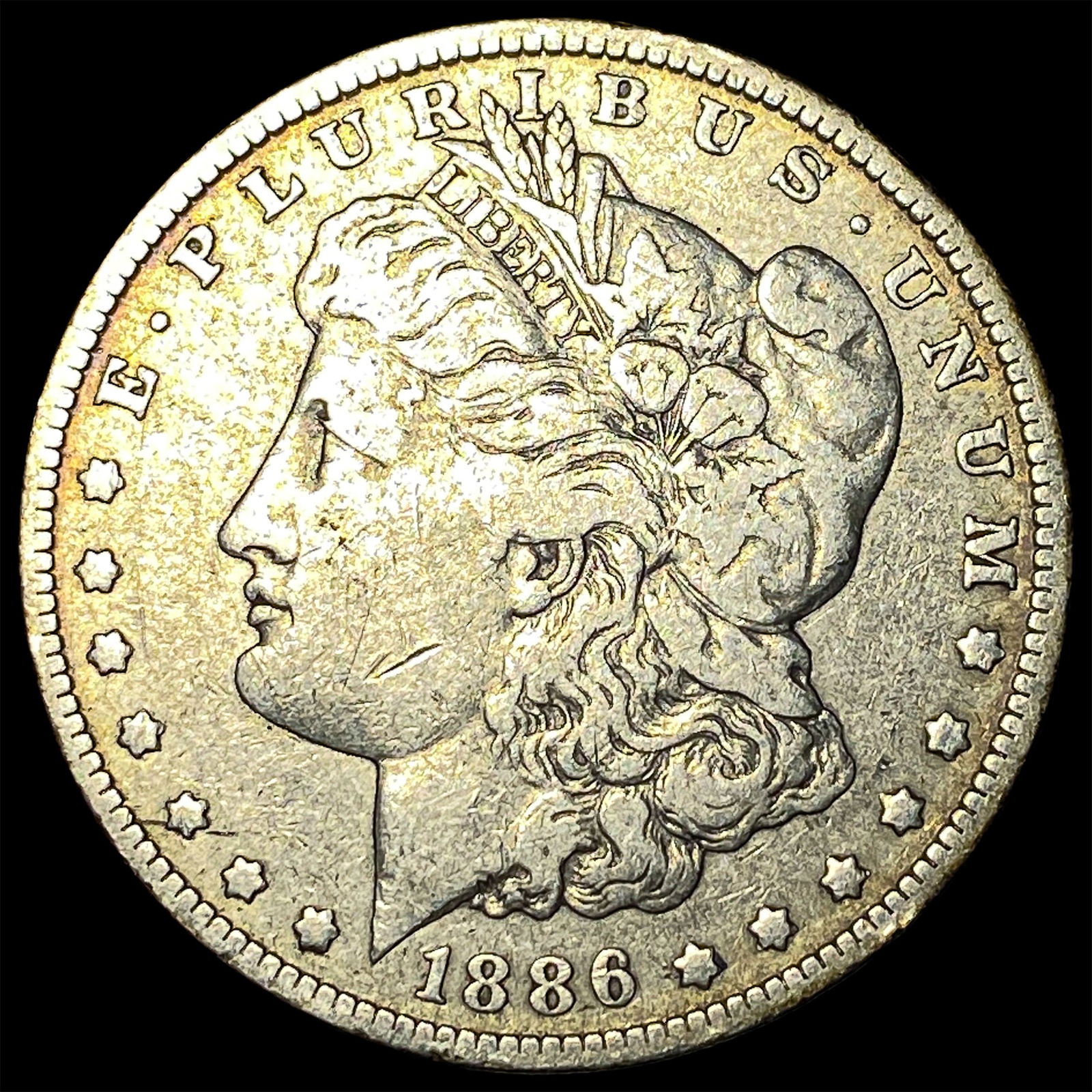 1886-O Silver Morgan Dollar ABOUT UNCIRCULATED (1 of 2)