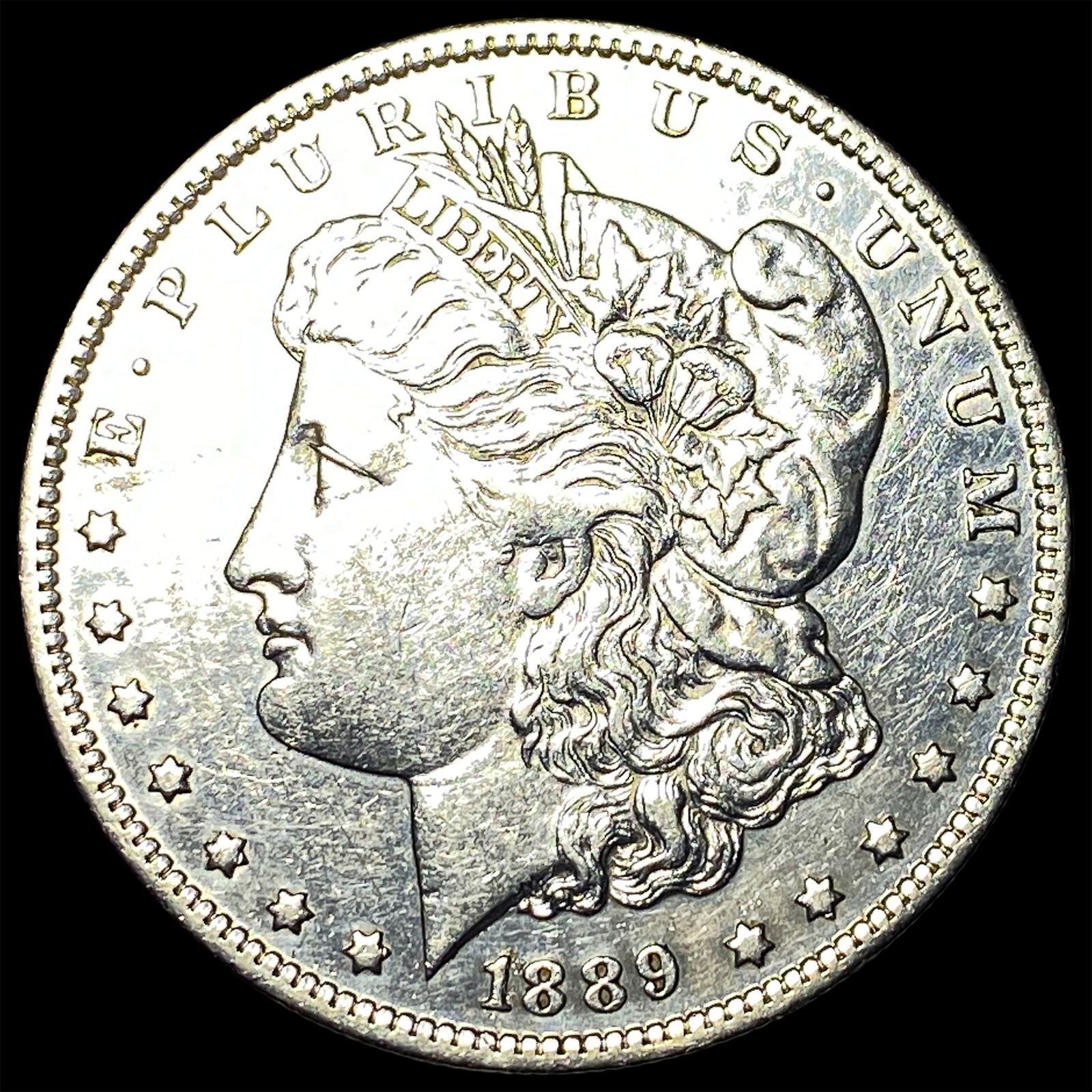 1889 Morgan Silver Dollar CLOSELY UNCIRCULATED (1 of 2)