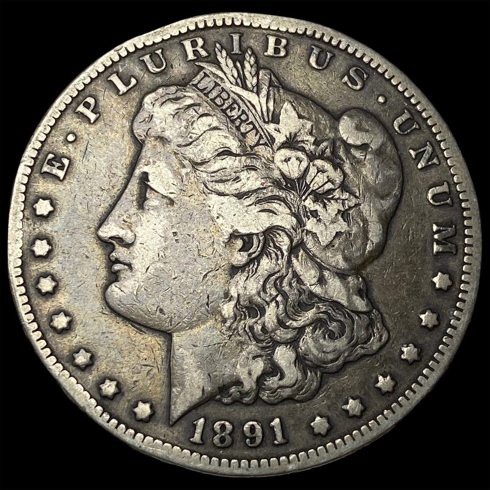 1891-CC Silver Morgan Dollar ABOUT UNCIRCULATED: 1891-CC Silver Morgan Dollar ABOUT UNCIRCULATED