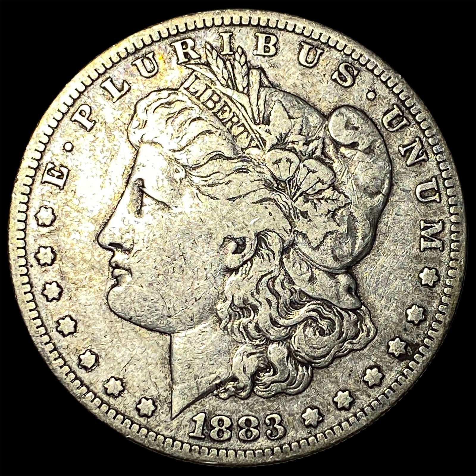 1883-S Silver Morgan Dollar ABOUT UNCIRCULATED: 1883-S Silver Morgan Dollar ABOUT UNCIRCULATED