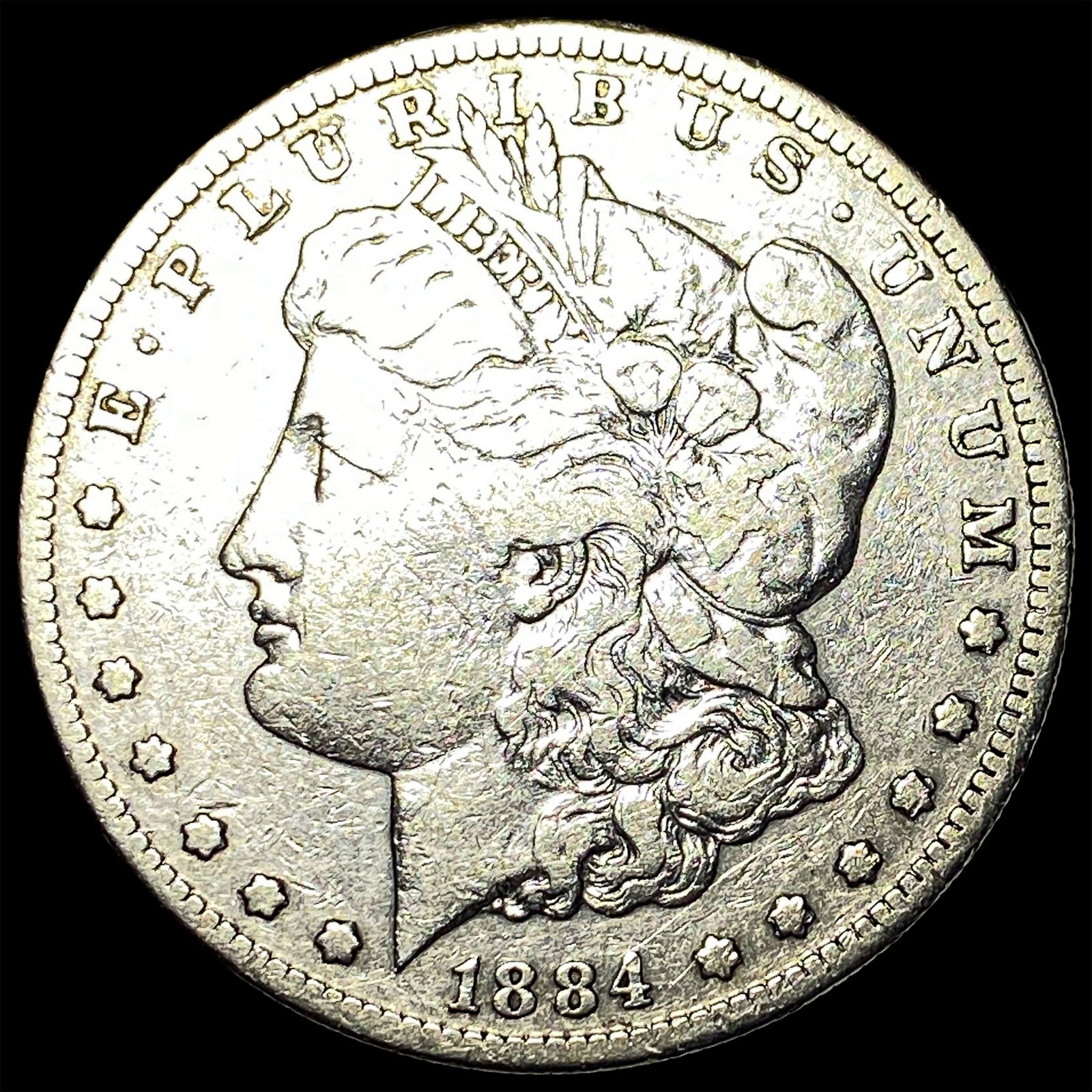 1884-O Silver Morgan Dollar ABOUT UNCIRCULATED (1 of 2)