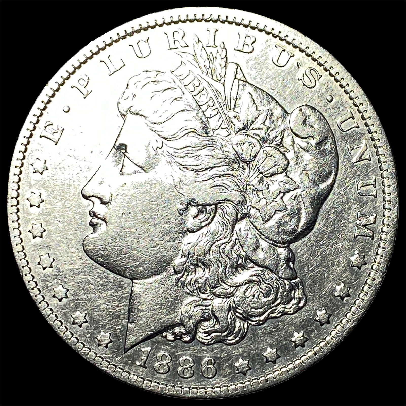 1886 Silver Morgan Dollar NEARLY UNCIRCULATED (1 of 2)