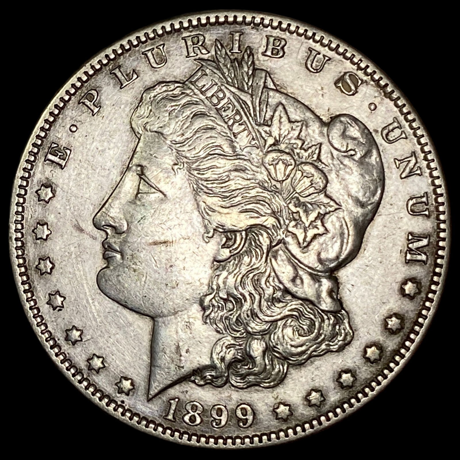 1899-O Micro O Silver Morgan Dollar CLOSELY UNCIRCULATED: 1899-O Micro O Silver Morgan Dollar CLOSELY UNCIRCULATED