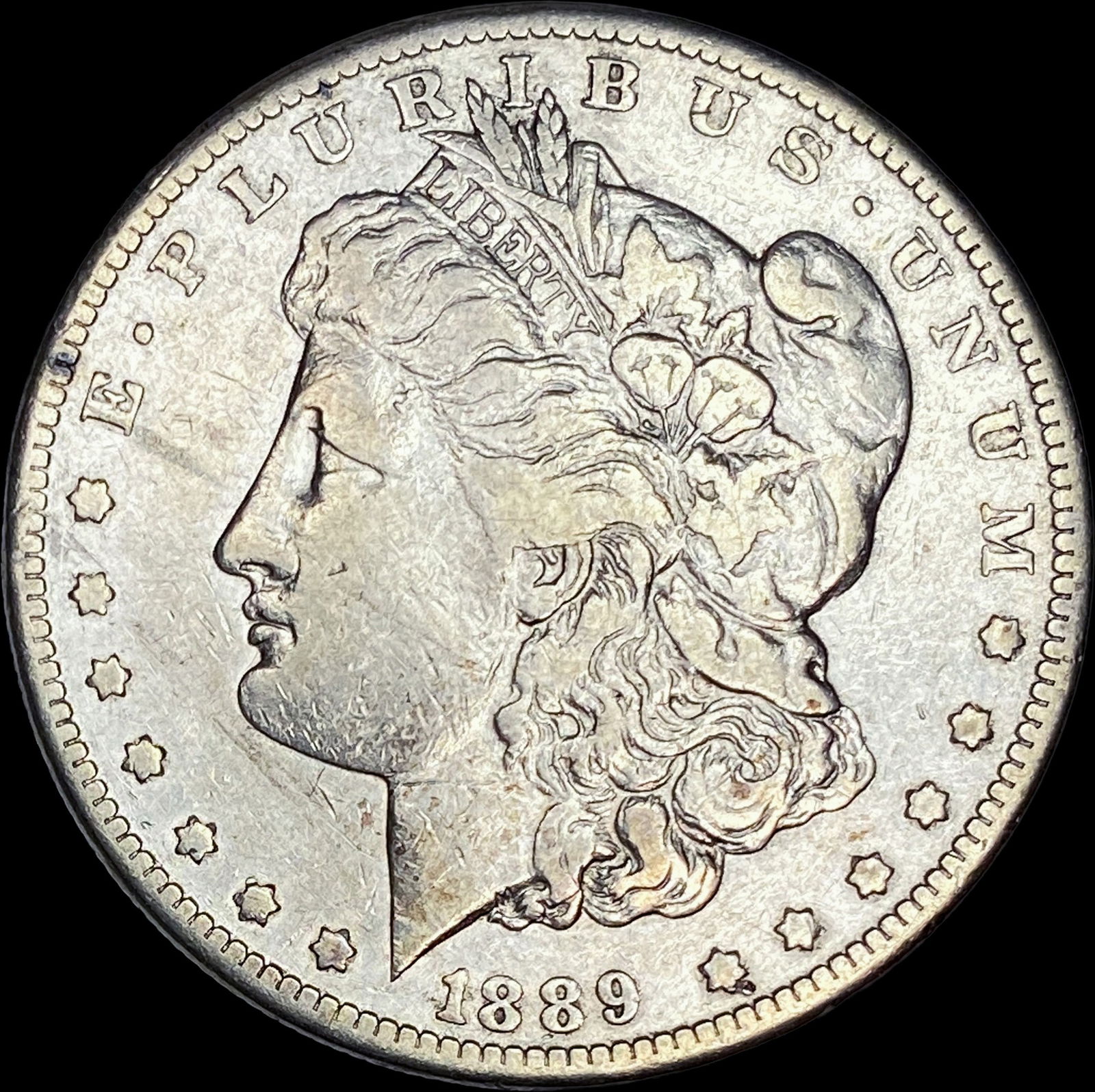 1889-CC Silver Morgan Dollar ABOUT UNCIRCULATED: 1889-CC Silver Morgan Dollar ABOUT UNCIRCULATED