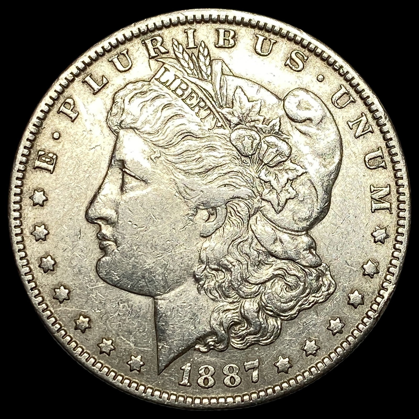1887-O Silver Morgan Dollar CLOSELY UNCIRCULATED (1 of 2)