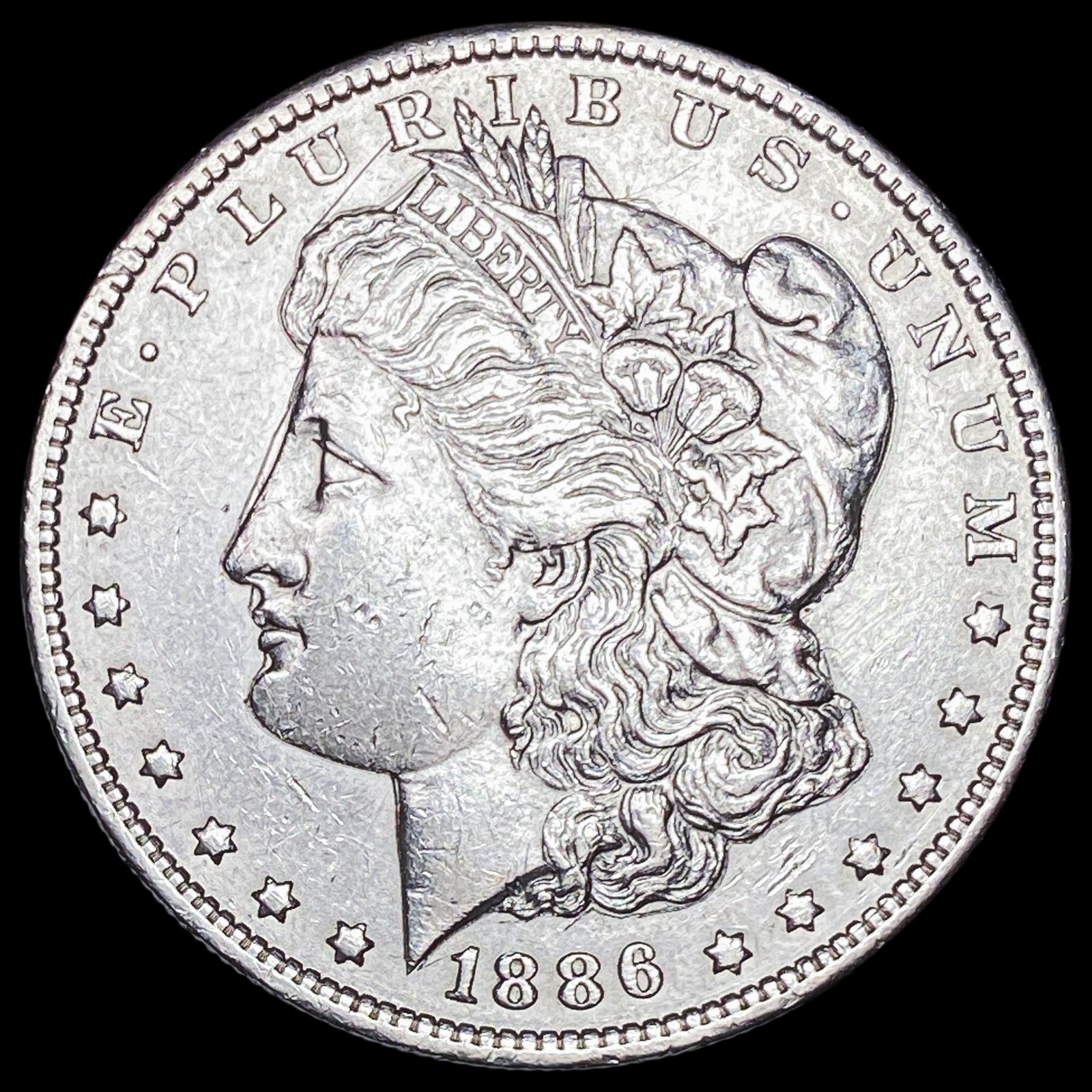1886-O Silver Morgan Dollar CLOSELY UNCIRCULATED: 1886-O Silver Morgan Dollar CLOSELY UNCIRCULATED