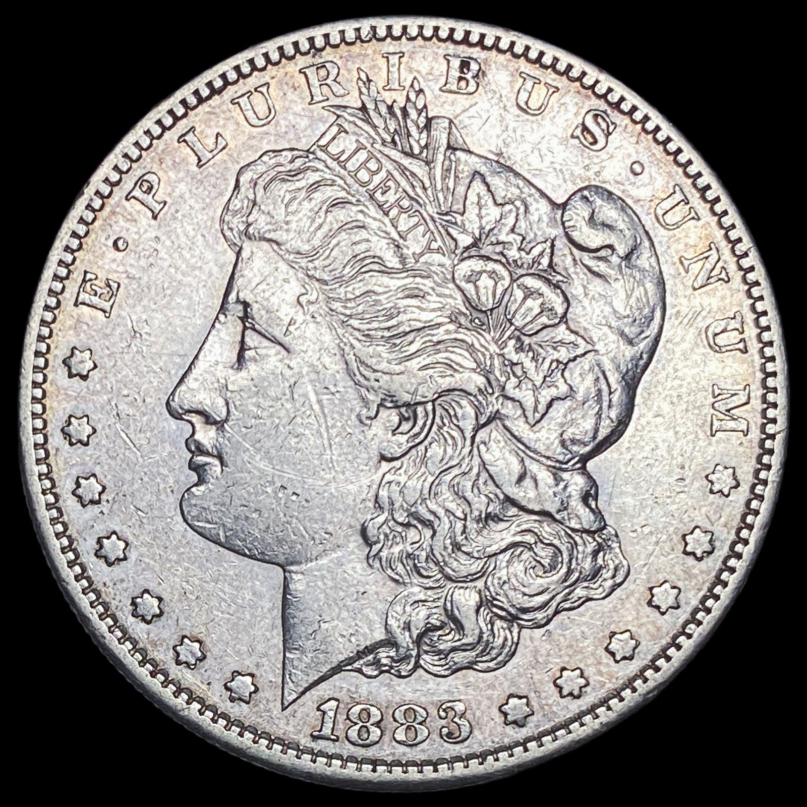 1883-S Silver Morgan Dollar CLOSELY UNCIRCULATED (1 of 2)