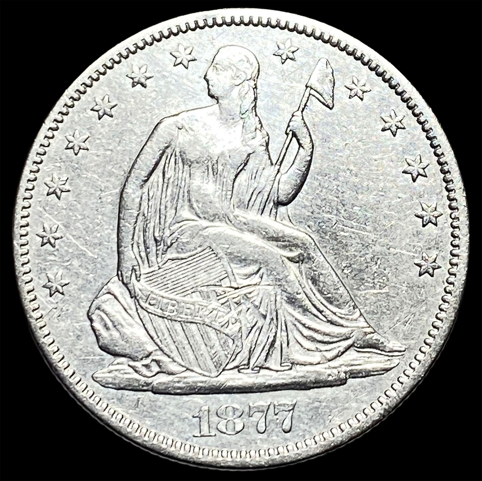 1877-S Silver Seated Liberty Half Dollar NEARLY UNCIRCULATED: 1877-S Silver Seated Liberty Half Dollar NEARLY UNCIRCULATED