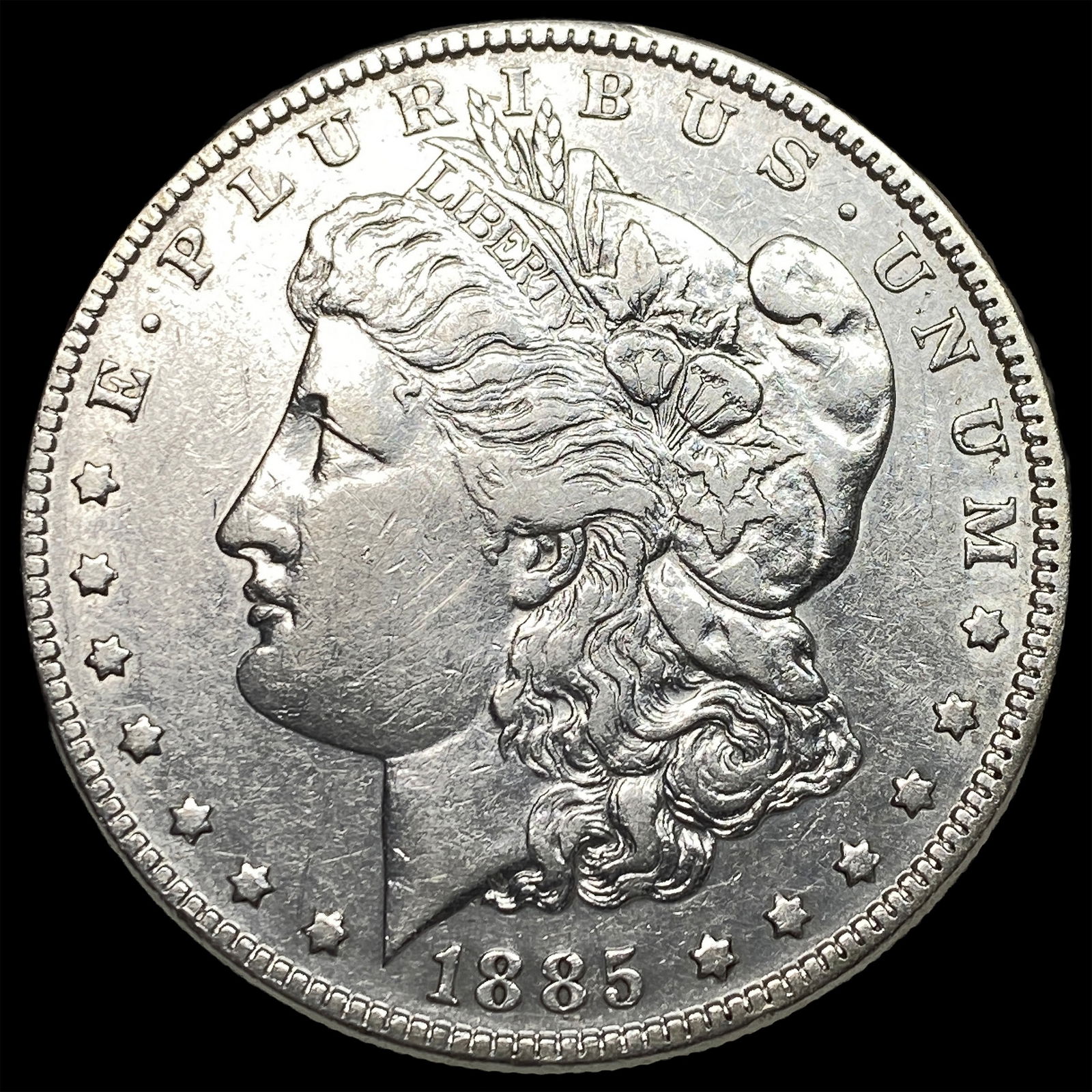1885 Silver Morgan Dollar CLOSELY UNCIRCULATED (1 of 2)
