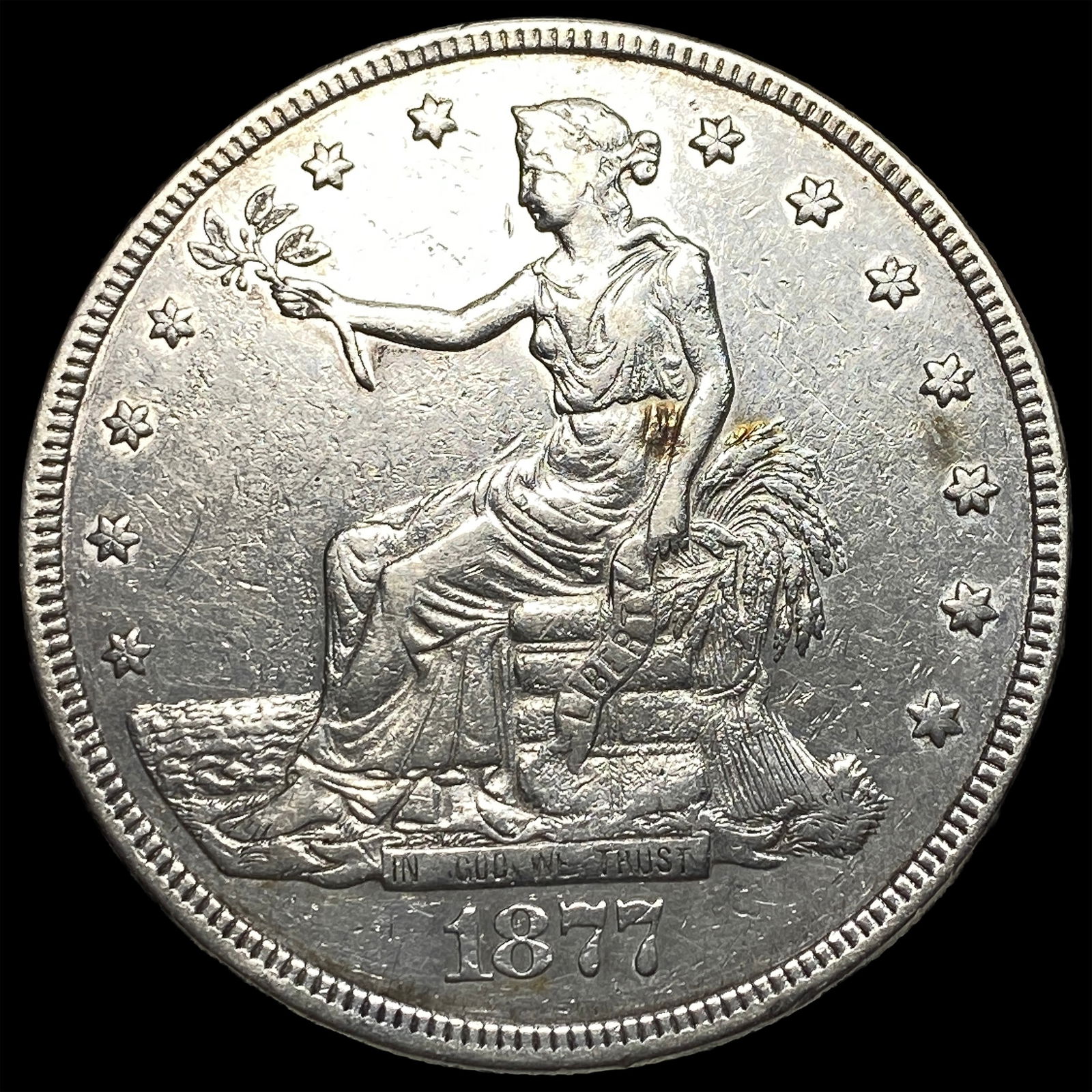 1877 Silver Trade Dollar CLOSELY UNCIRCULATED (1 of 2)
