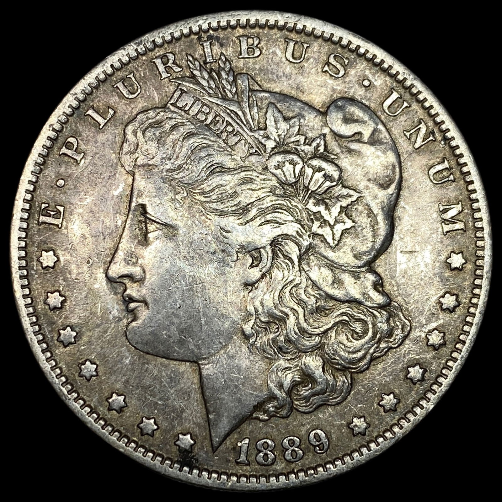 1889-O Silver Morgan Dollar NEARLY UNCIRCULATED (1 of 2)