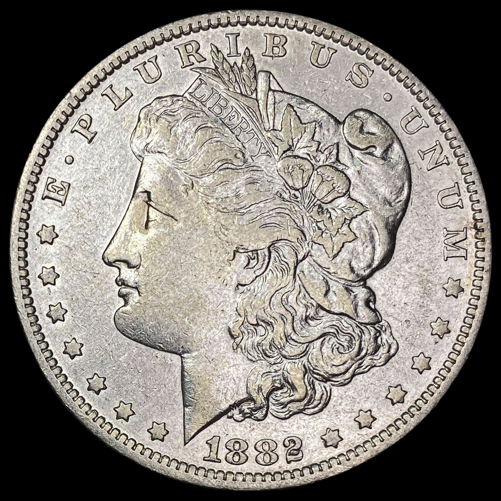 1882-O/S Morgan Silver Dollar CLOSELY UNCIRCULATED (1 of 2)