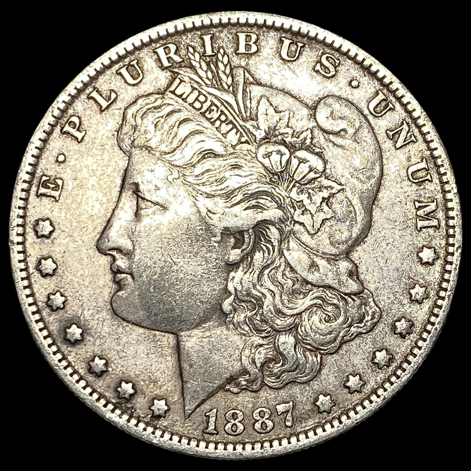 1887-O Silver Morgan Dollar NEARLY UNCIRCULATED (1 of 2)