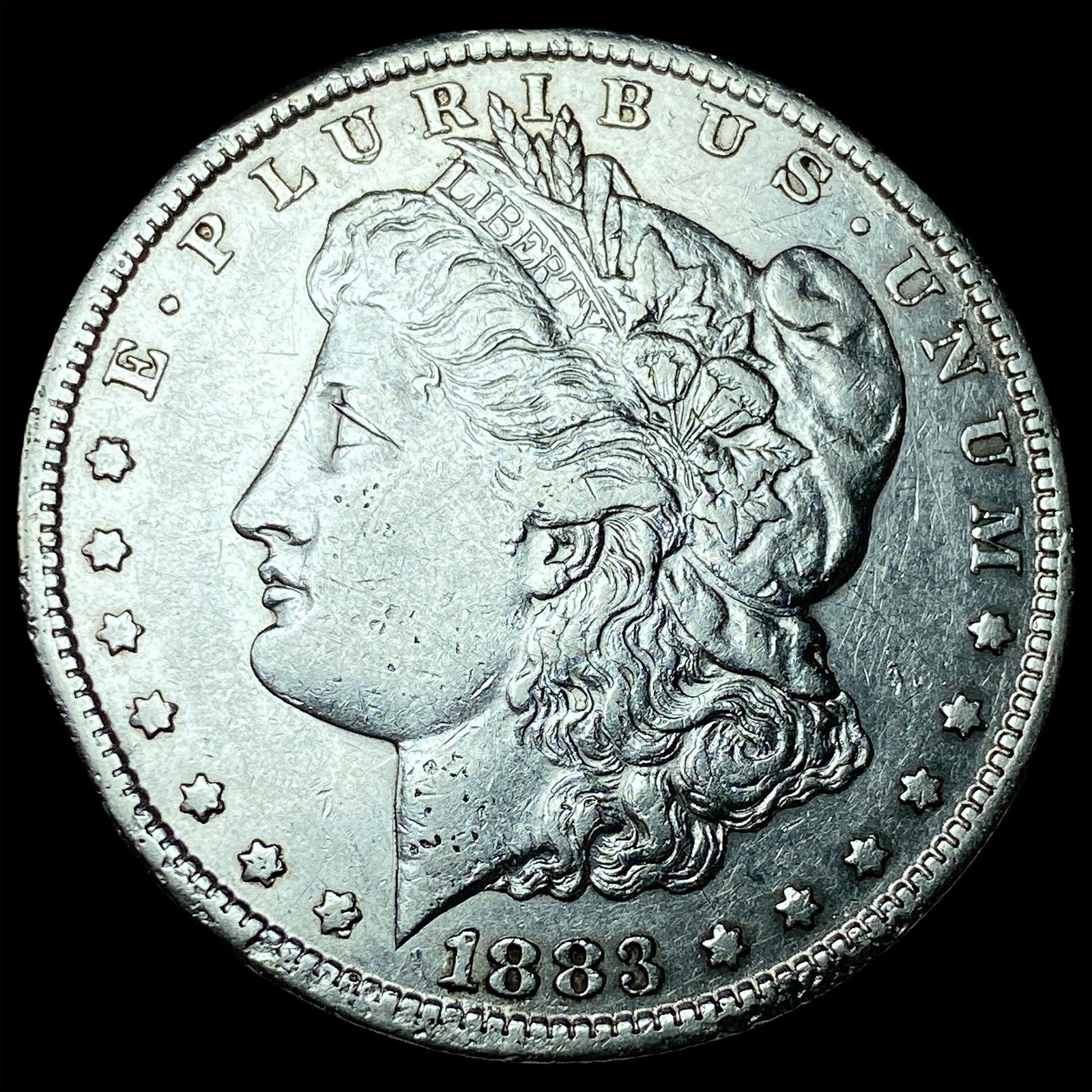 1883-CC Silver Morgan Dollar CLOSELY UNCIRCULATED (1 of 2)