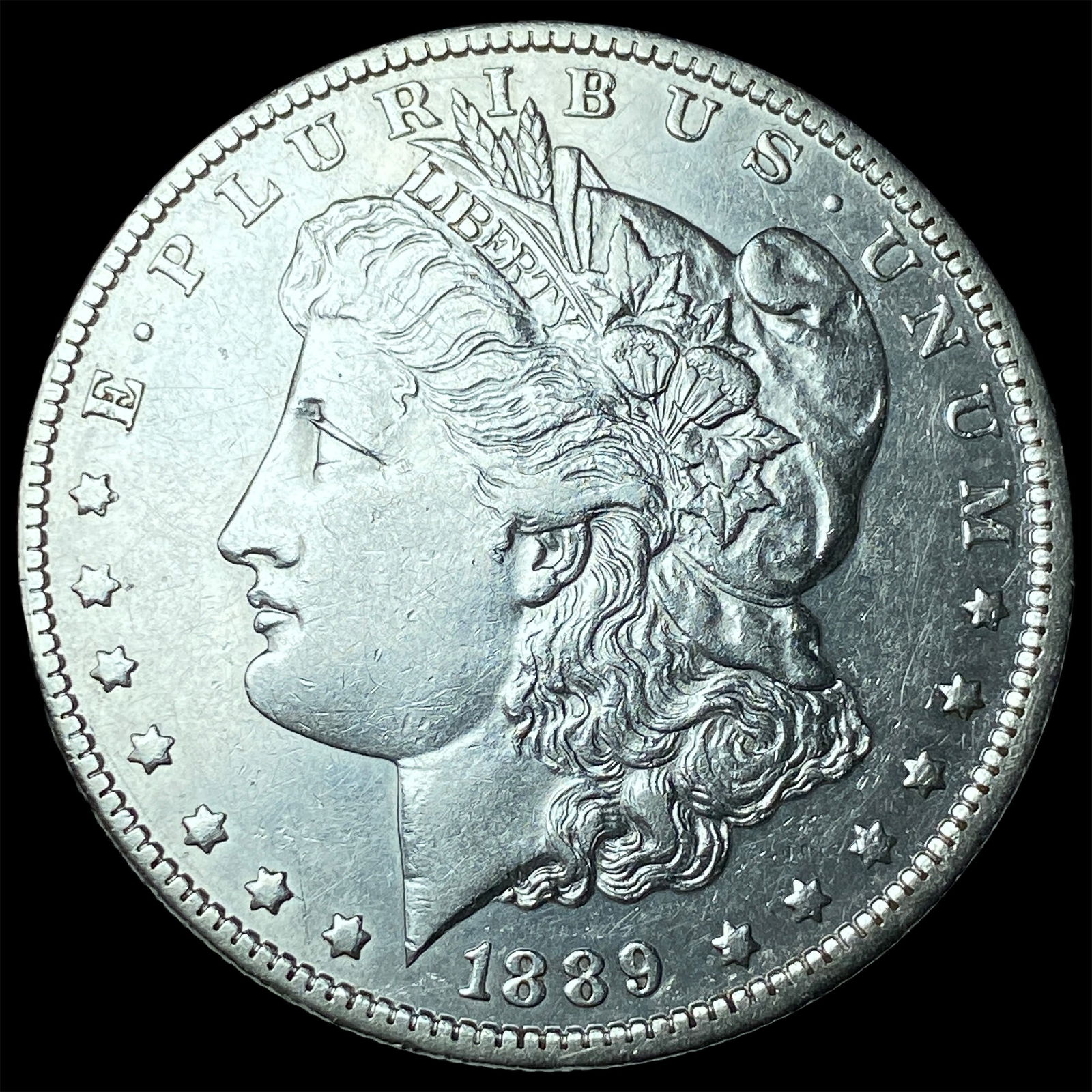 1889-O Silver Morgan Dollar CLOSELY UNCIRCULATED (1 of 2)