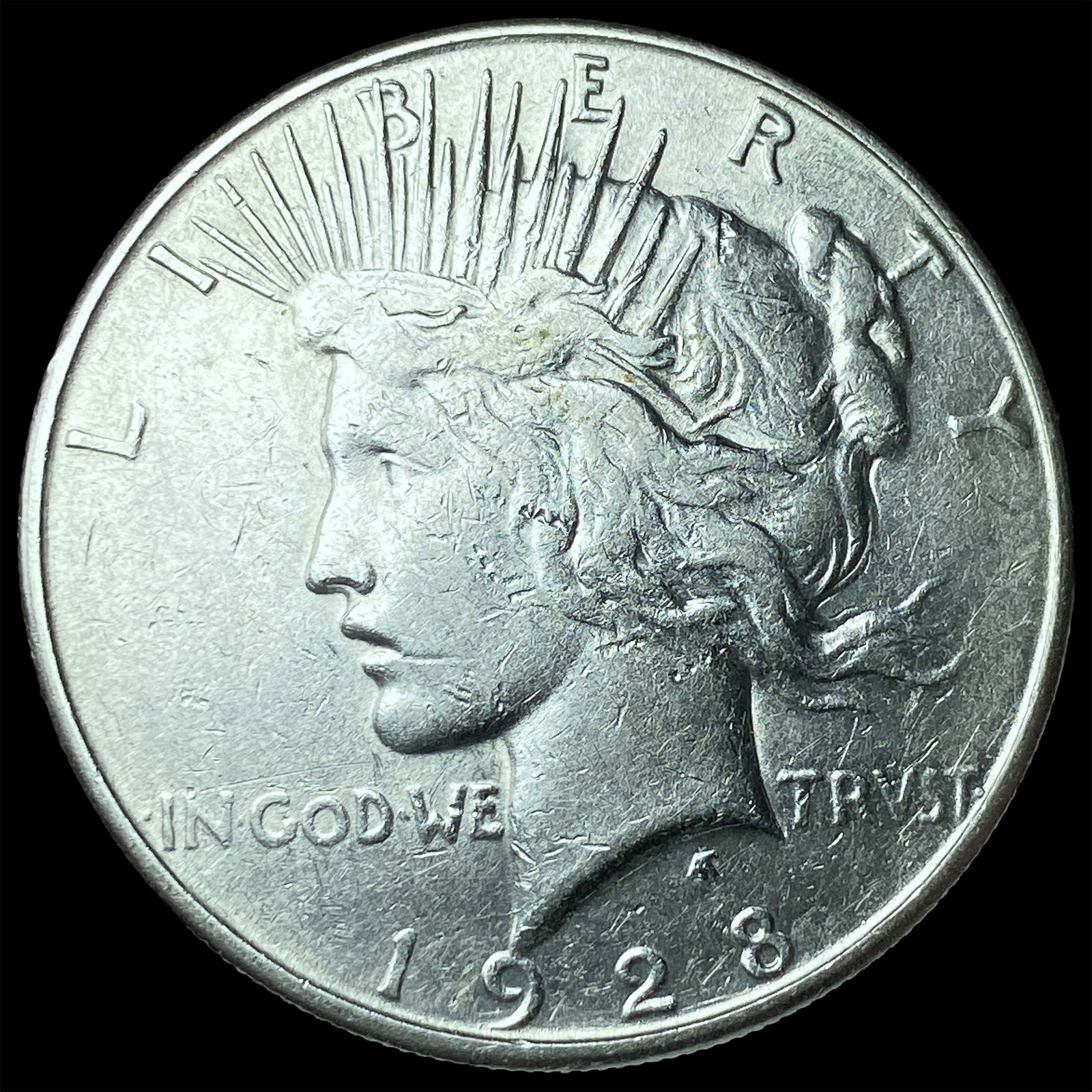 1928 Peace Silver Dollar NEARLY UNCIRCULATED (1 of 2)