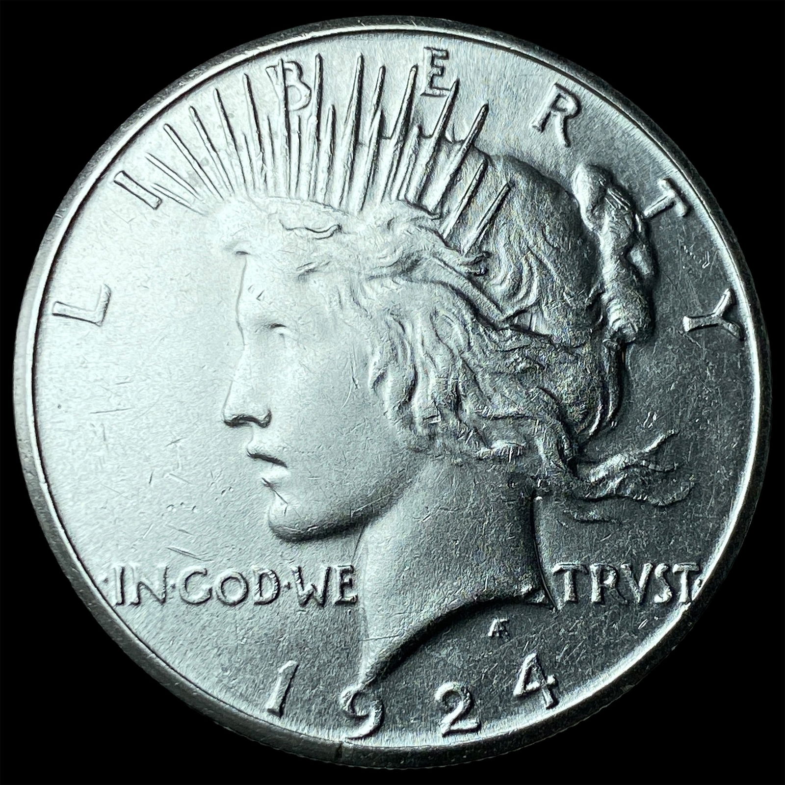 1924 Peace Silver Dollar CLOSELY UNCIRCULATED (1 of 2)
