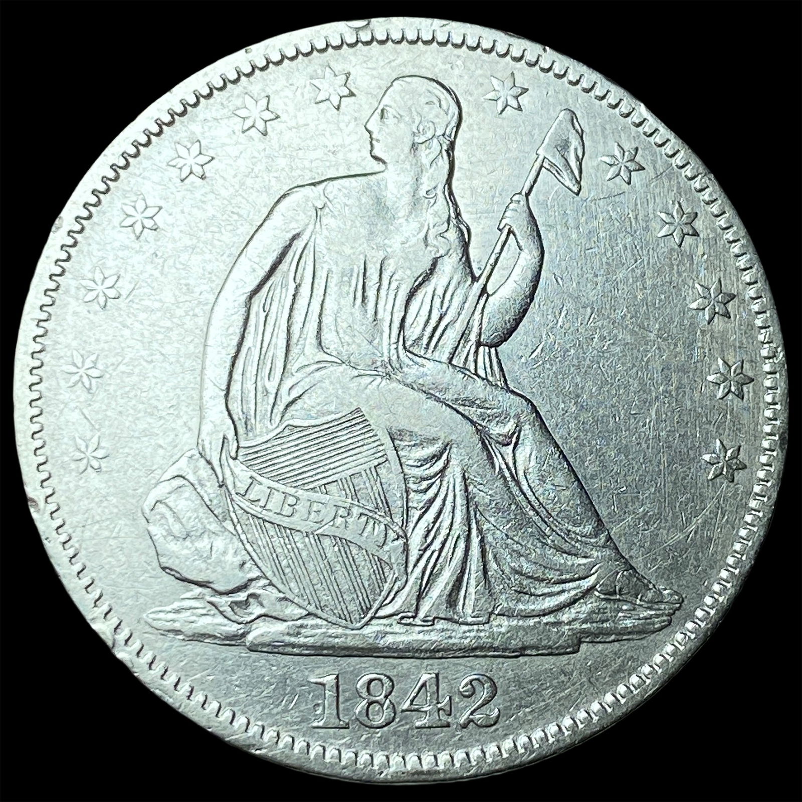 1842-O Silver Half Dollar NEARLY UNCIRCULATED (1 of 2)